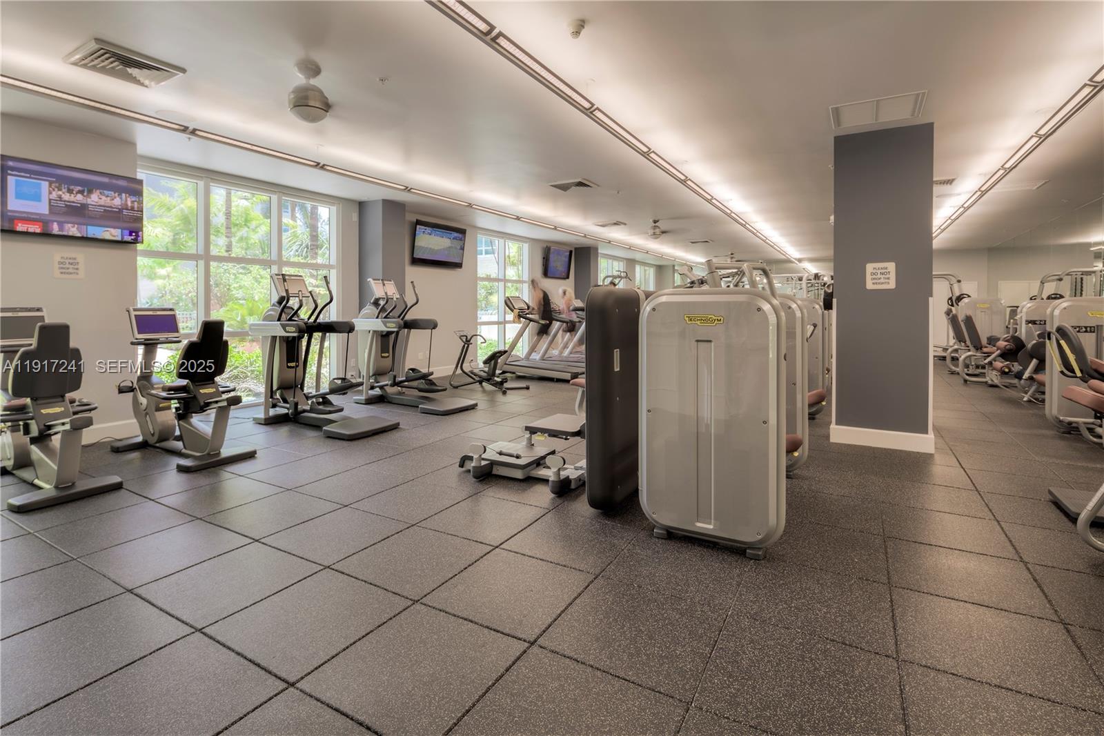 2001 Biscayne Boulevard, Unit 2409 Miami, FL 33137 - Photo 39 of 48 a view of a room with gym equipment