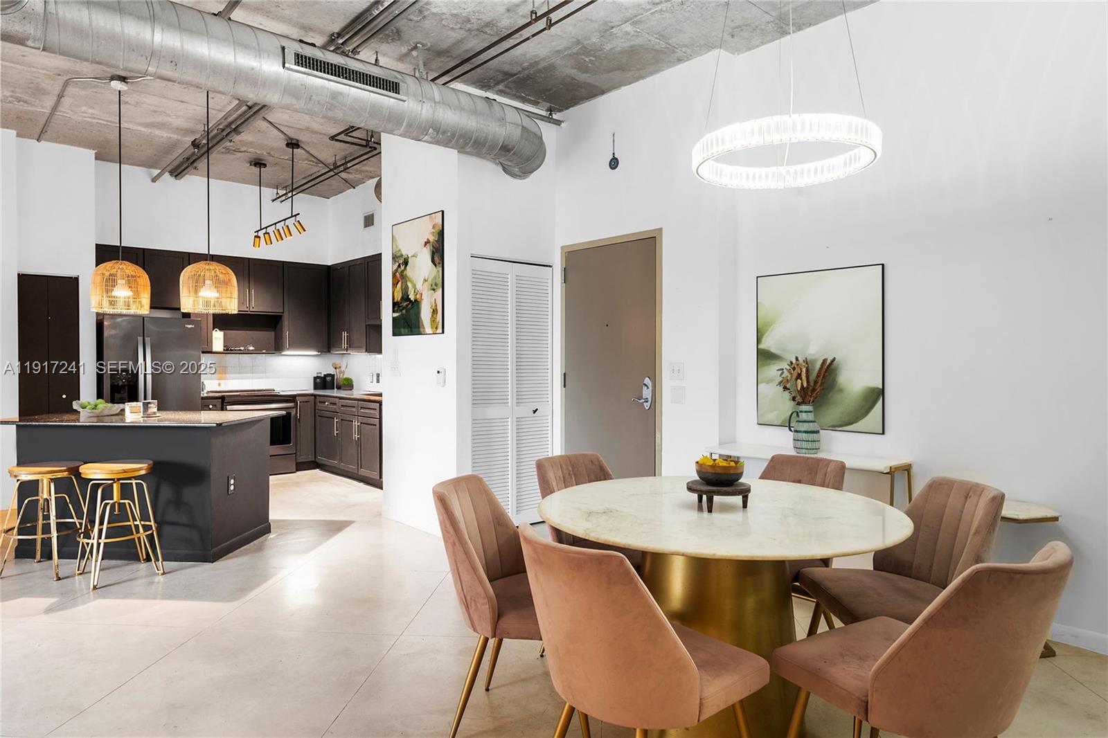 2001 Biscayne Boulevard, Unit 2409 Miami, FL 33137 - Photo 5 of 48 a view of a dining room with furniture