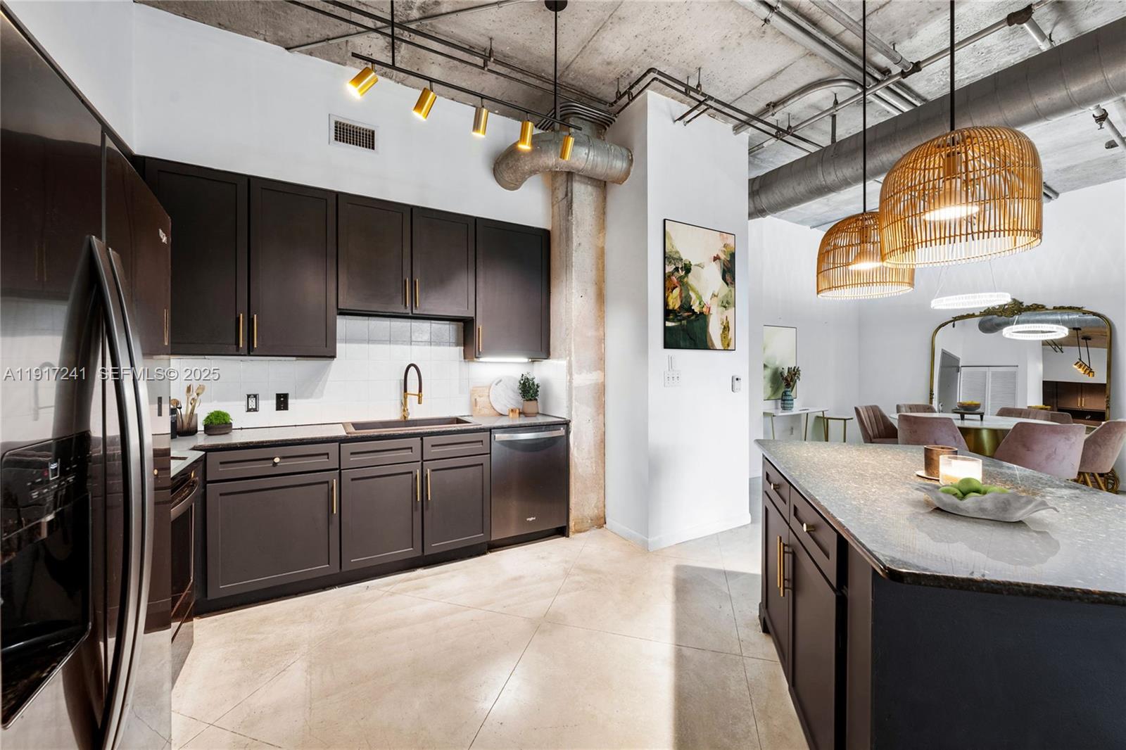 2001 Biscayne Boulevard, Unit 2409 Miami, FL 33137 - Photo 8 of 48 a kitchen with a sink a stove and refrigerator