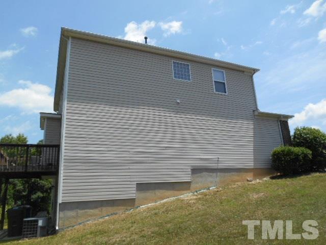 6131 Ricker Road Raleigh, NC 27610 - Photo 2 of 15 a view of a backyard of the house
