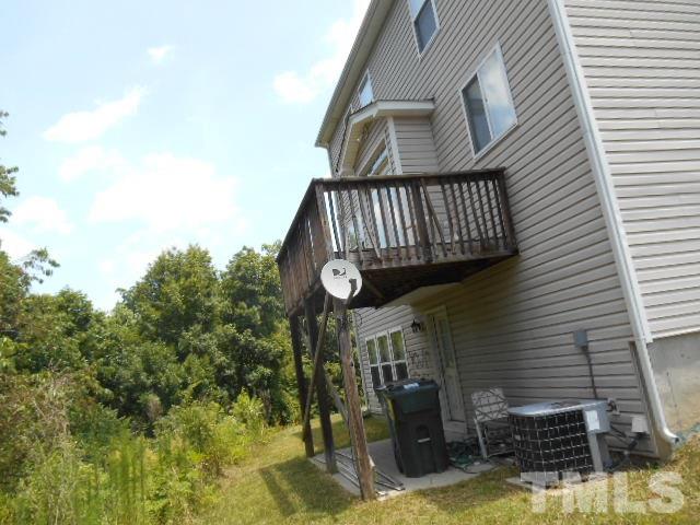 6131 Ricker Road Raleigh, NC 27610 - Photo 3 of 15 a view of entryway with backyard