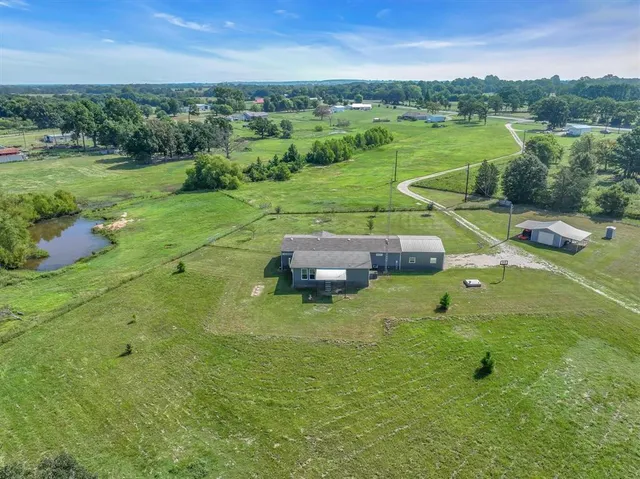 a garden view with a lake view