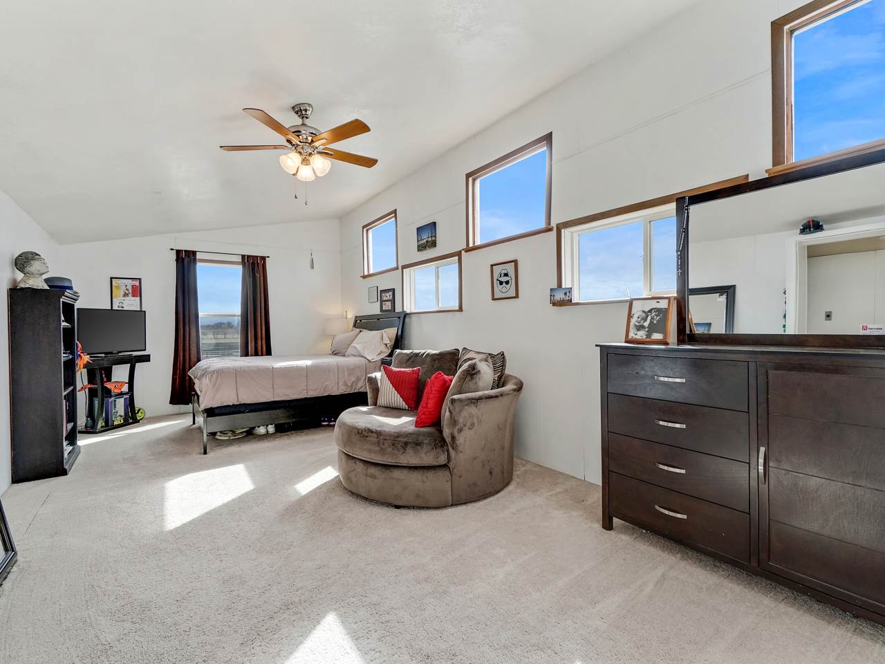 1195 19 Road Fruita, CO 81521 - Photo 15 of 31 a living room with furniture and a cabinet