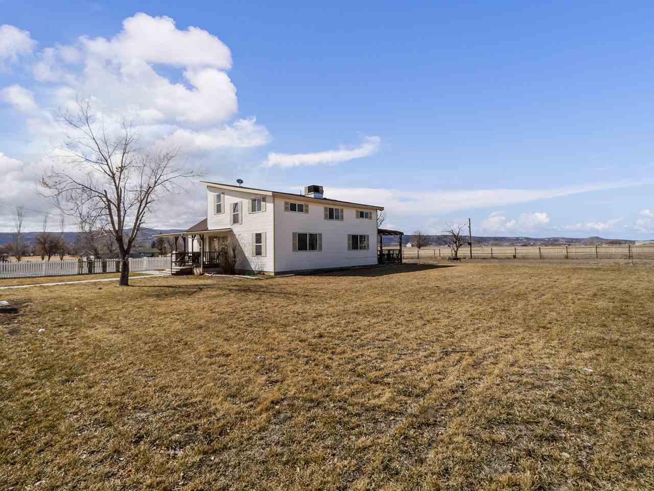 1195 19 Road Fruita, CO 81521 - Photo 30 of 31 a view of a large building with a yard