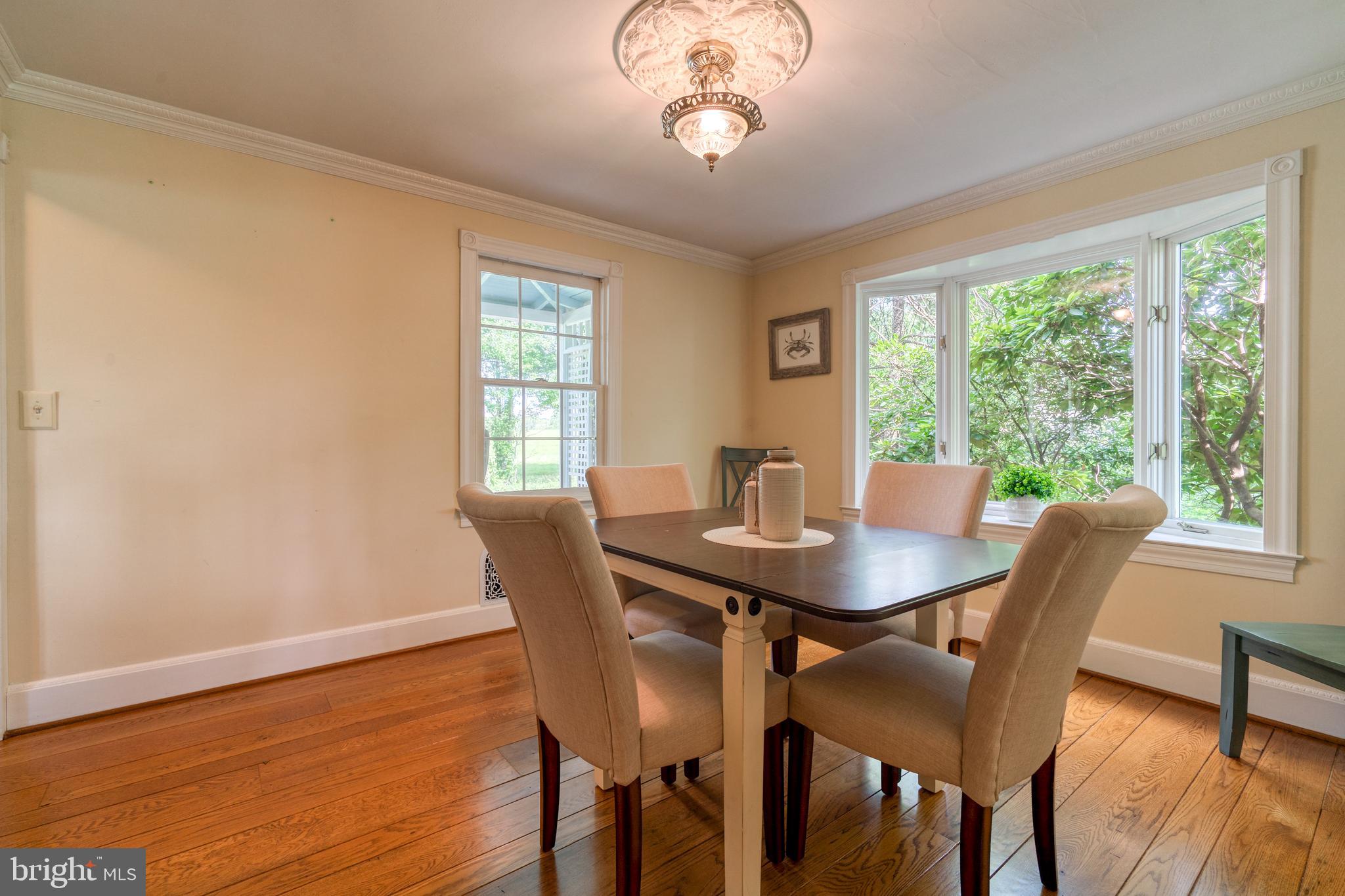 1728 Appleton Road Elkton, MD 21921 - Photo 12 of 36 a view of a dining room with furniture window and wooden floor