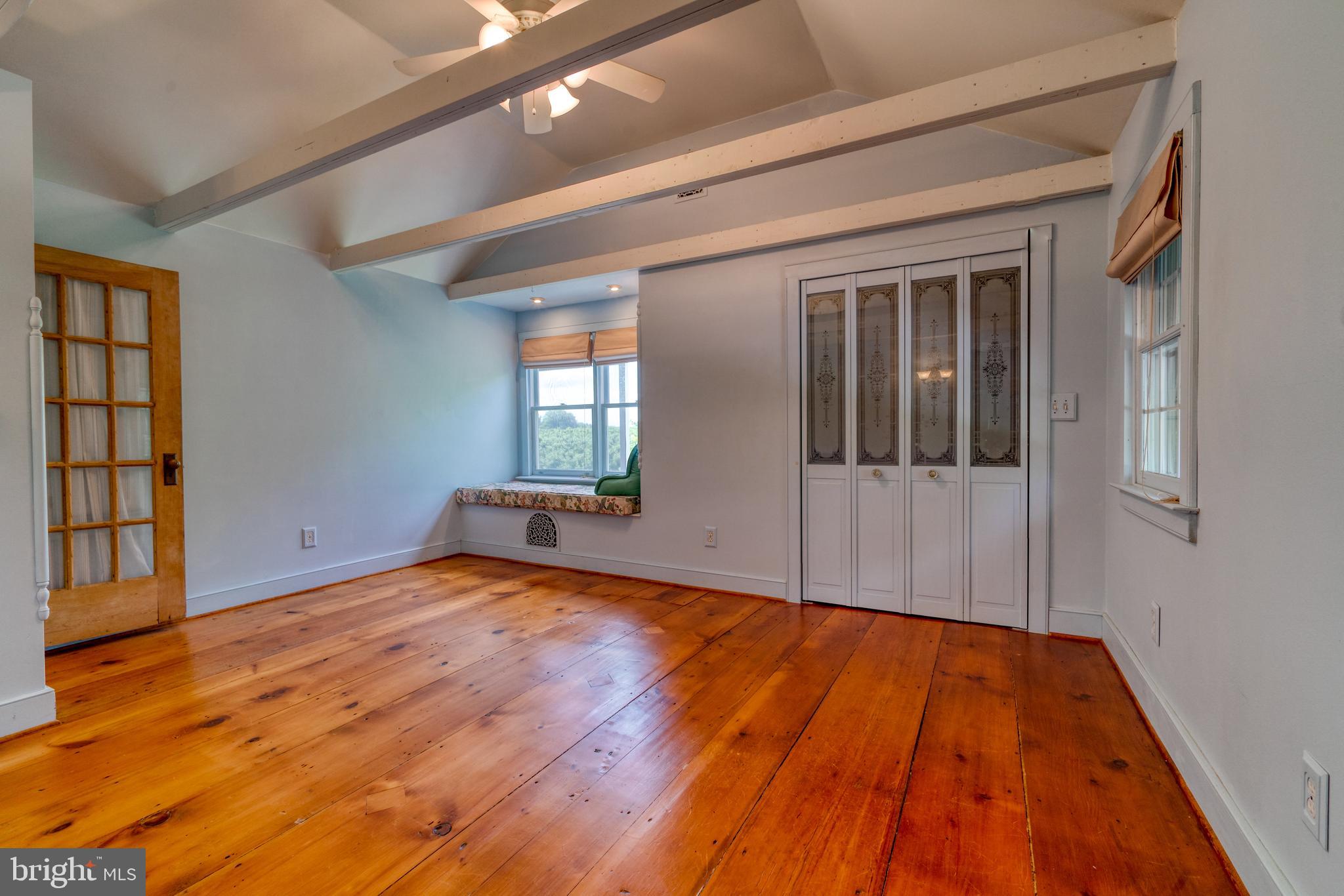 1728 Appleton Road Elkton, MD 21921 - Photo 26 of 36 wooden floor in an empty room with a window