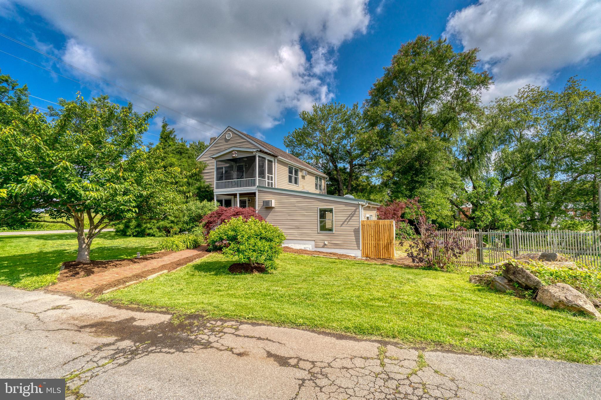 1728 Appleton Road Elkton, MD 21921 - Photo 5 of 36 a front view of a house with garden