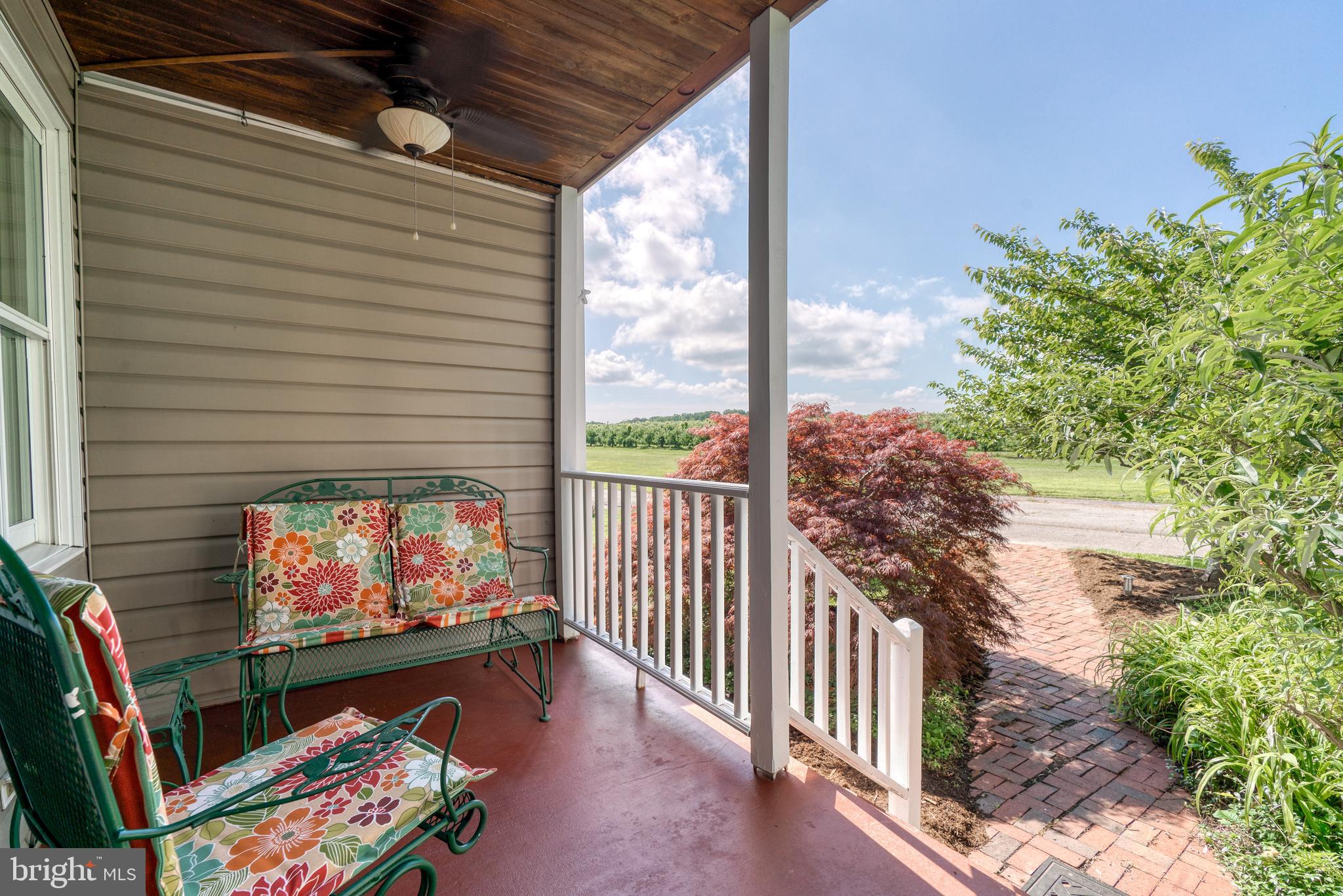1728 Appleton Road Elkton, MD 21921 - Photo 6 of 36 a outdoor living space with furniture and a potted plant