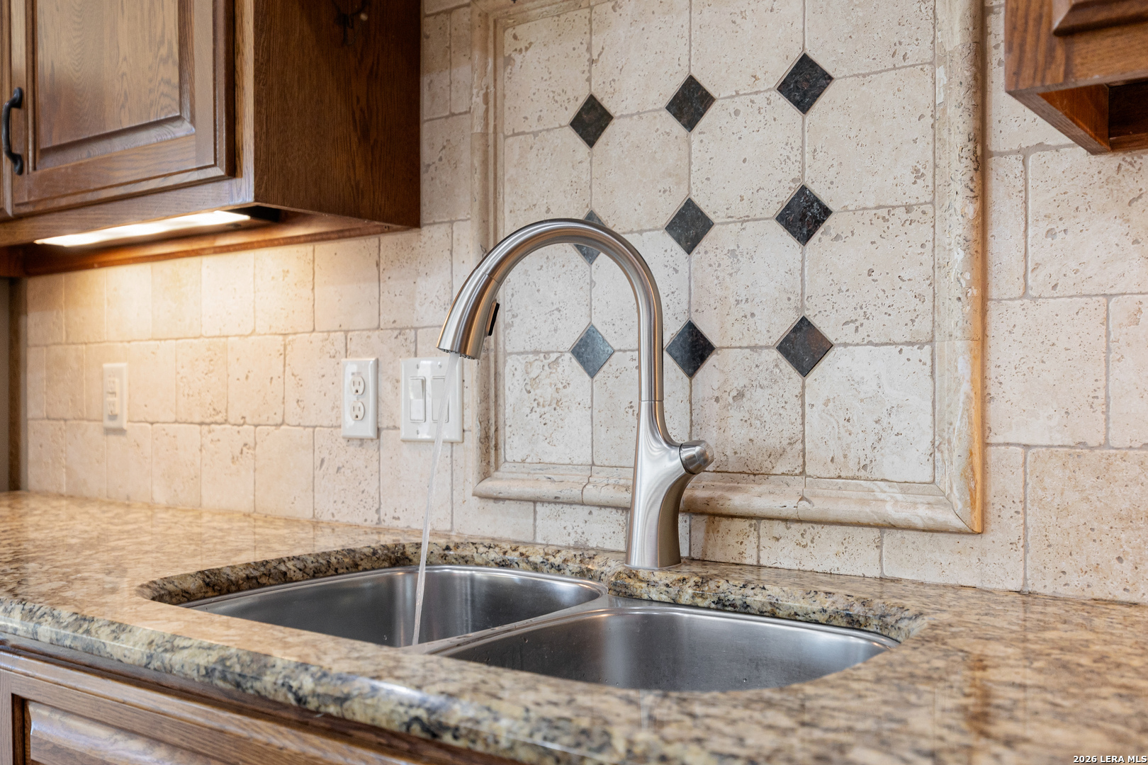 133 Vintage Ranch Circle La Vernia, TX 78121 - Photo 16 of 48 a close view of a sink and tap