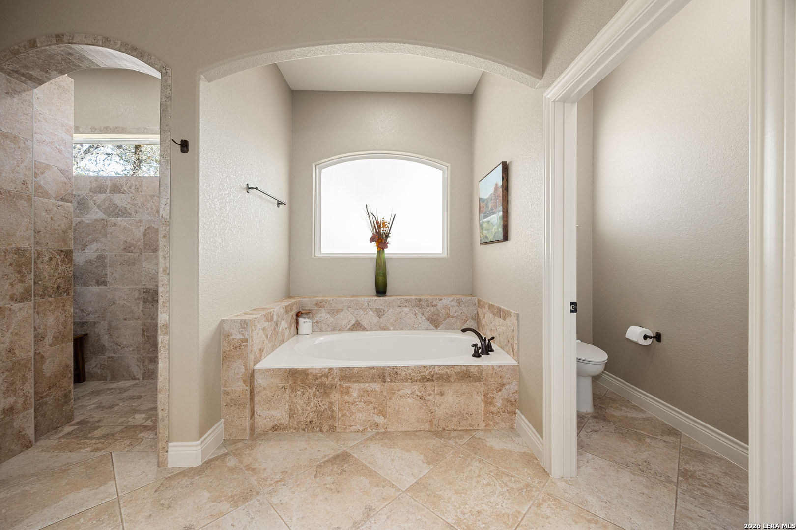 133 Vintage Ranch Circle La Vernia, TX 78121 - Photo 26 of 48 a bathroom with a tub shower and sink