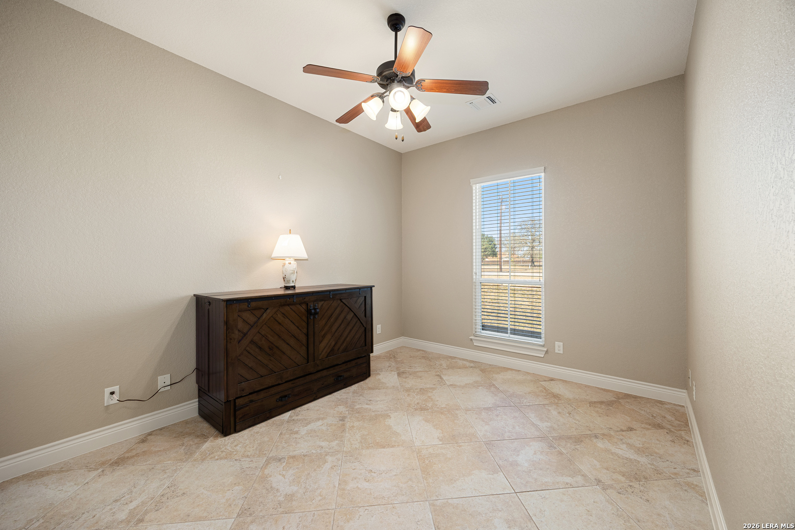 133 Vintage Ranch Circle La Vernia, TX 78121 - Photo 31 of 48 a living room with furniture and a chandelier
