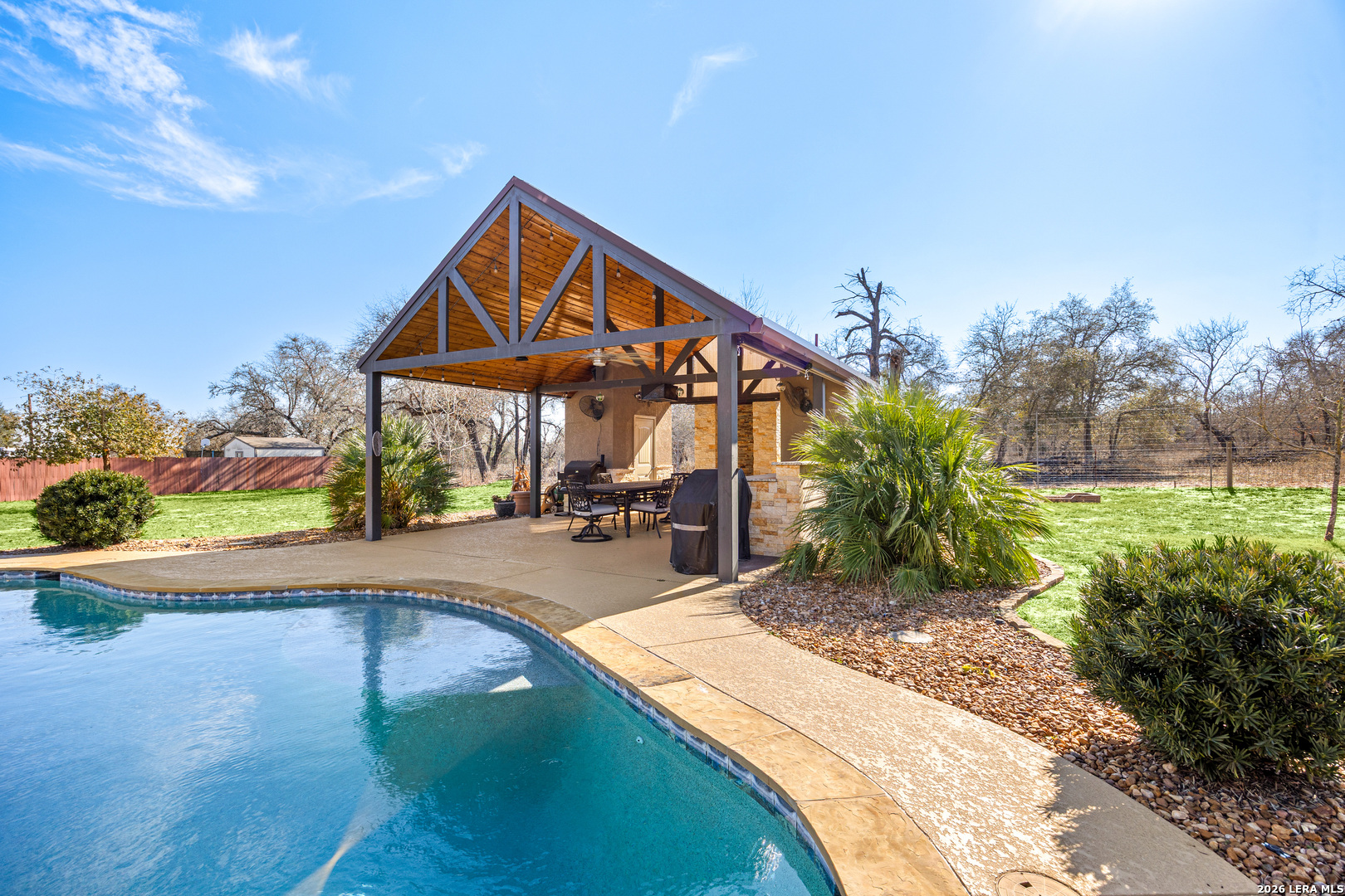 133 Vintage Ranch Circle La Vernia, TX 78121 - Photo 35 of 48 a view of a house with backyard and sitting area