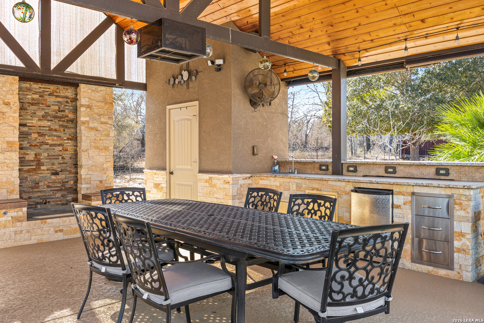 133 Vintage Ranch Circle La Vernia, TX 78121 - Photo 38 of 48 a view of an outside dining space with furniture window and outside view