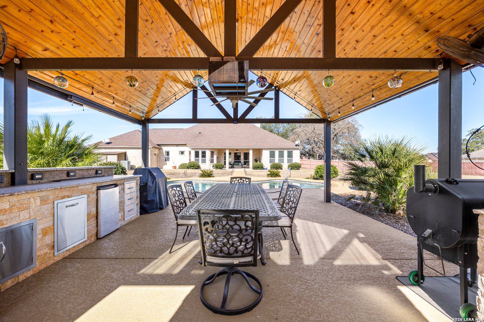 133 Vintage Ranch Circle La Vernia, TX 78121 - Photo 39 of 48 a view of an outdoor dining space with a patio
