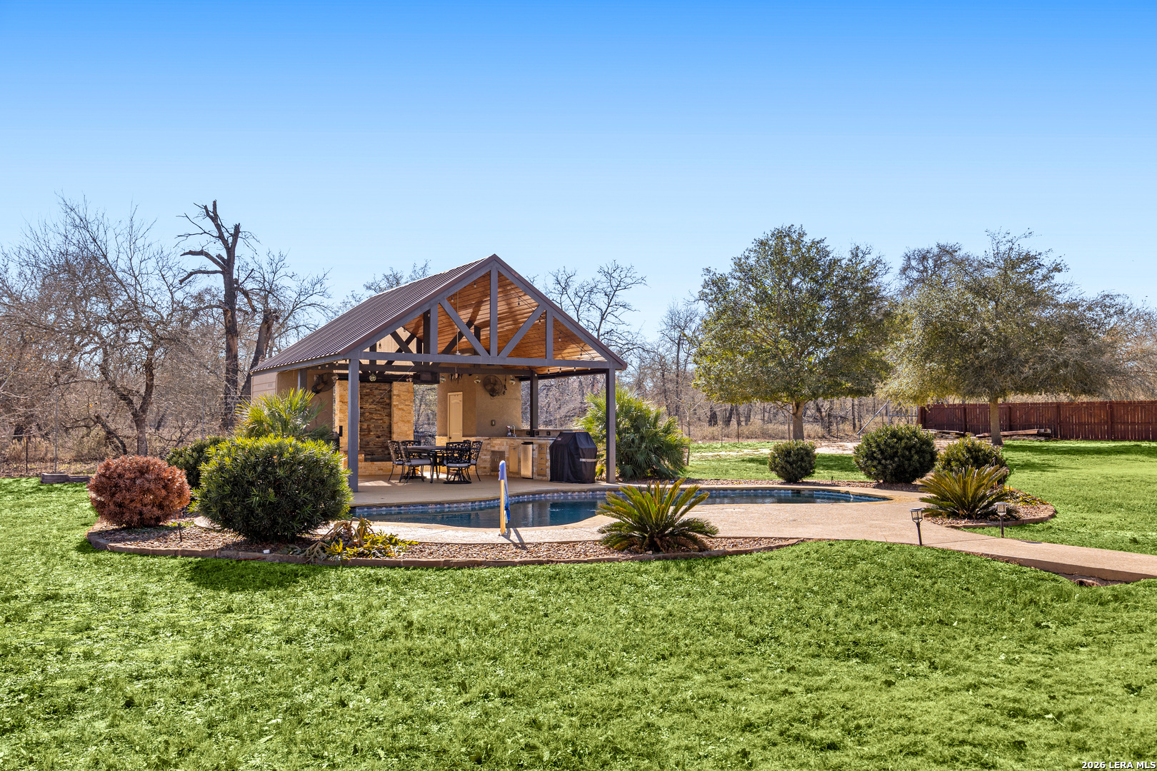 133 Vintage Ranch Circle La Vernia, TX 78121 - Photo 41 of 48 a front view of a house with garden