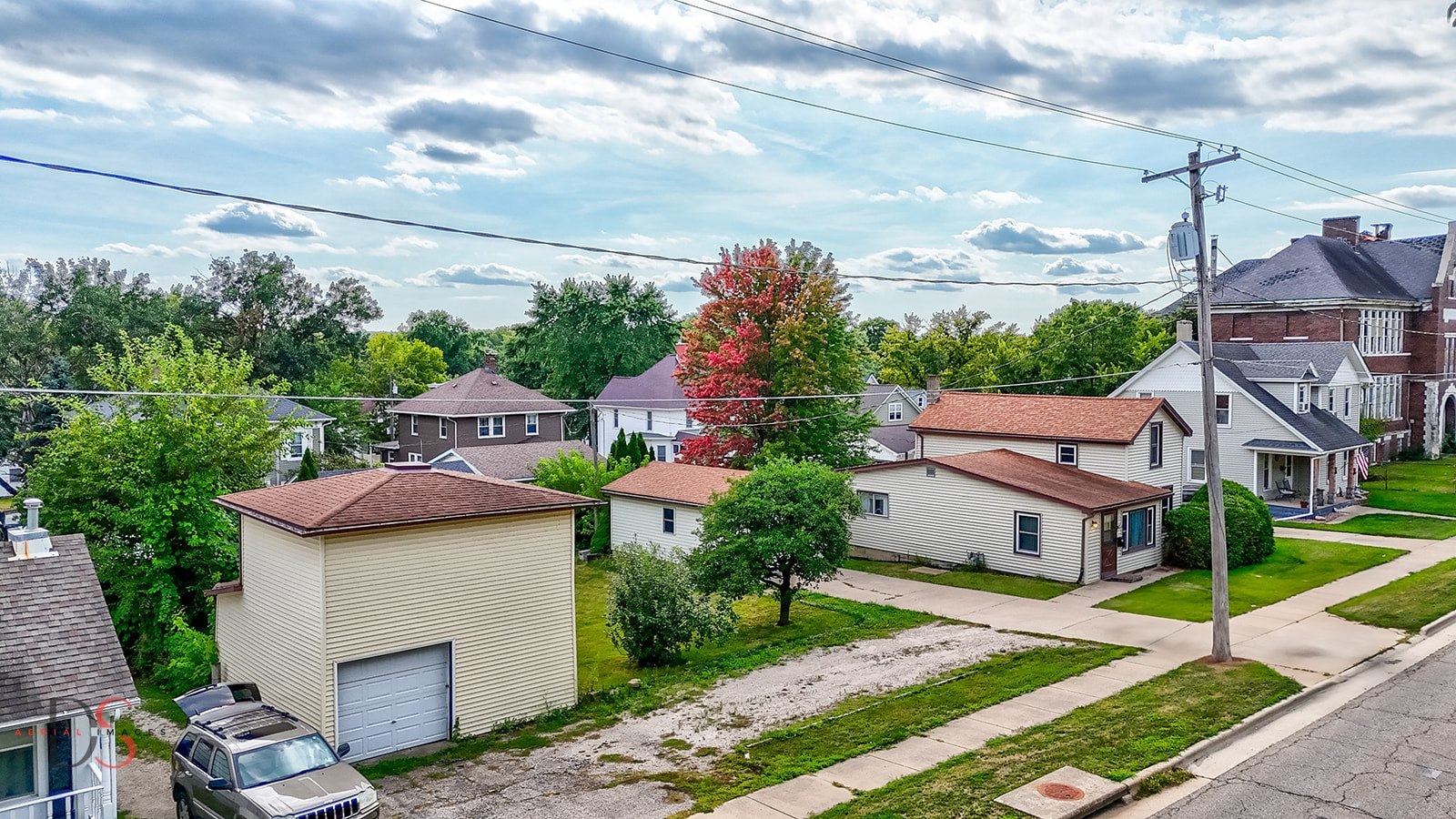 414 West Bluff Street Marseilles, IL 61341 - Photo 18 of 27 a view of a house with a yard and potted plants