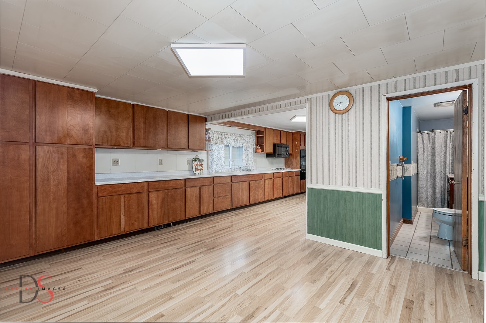 414 West Bluff Street Marseilles, IL 61341 - Photo 7 of 27 a view of a kitchen with wooden floor and a kitchen