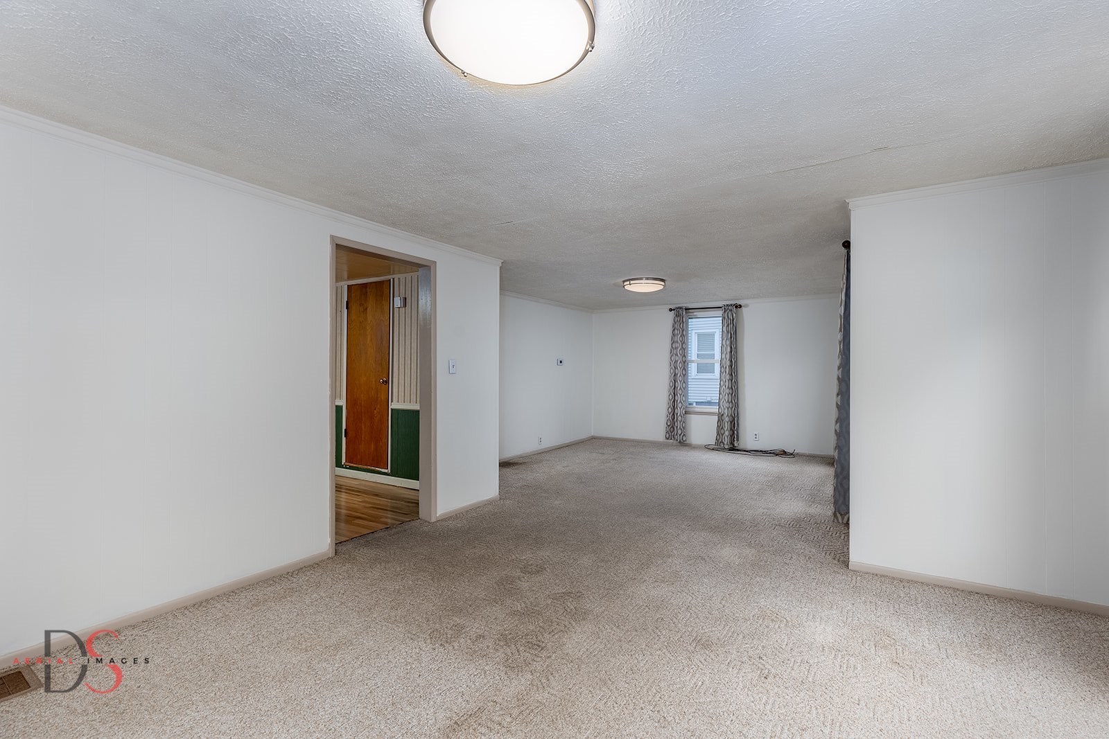 414 West Bluff Street Marseilles, IL 61341 - Photo 8 of 27 a view of empty room with windows