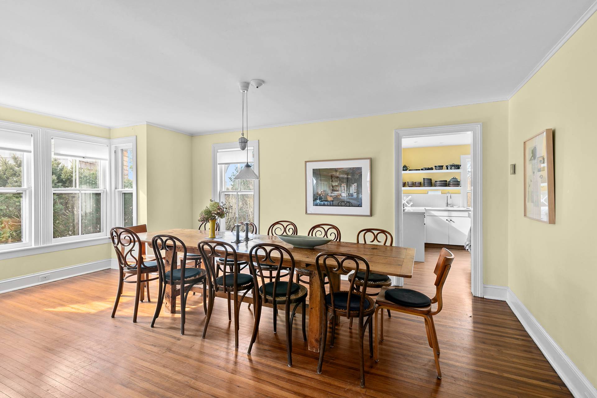 Undisclosed Address Sag Harbor, NY 11963 - Photo 4 of 14 a view of a dining room with furniture and wooden floor