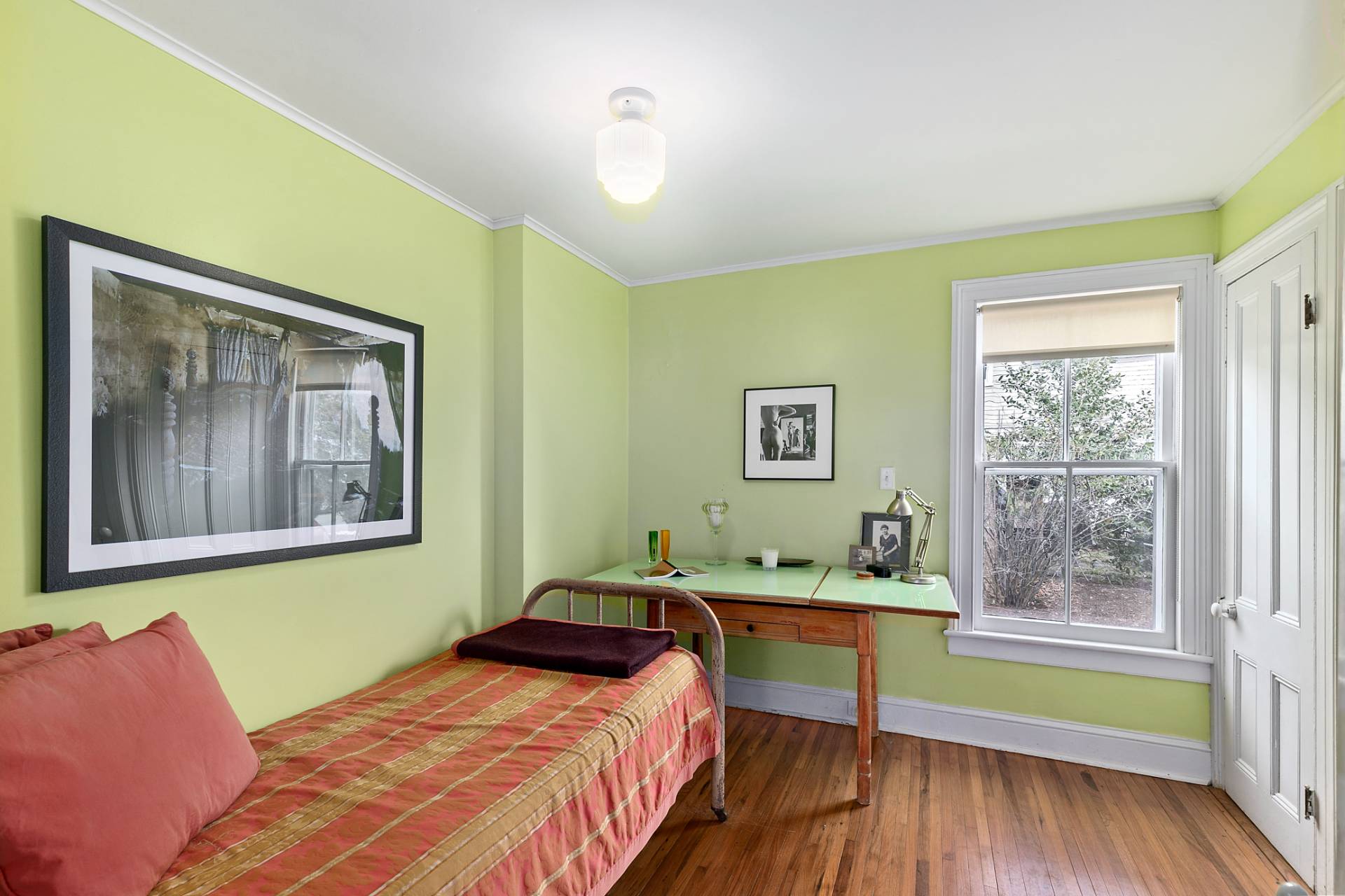 Undisclosed Address Sag Harbor, NY 11963 - Photo 8 of 14 a bedroom with a bed and a window