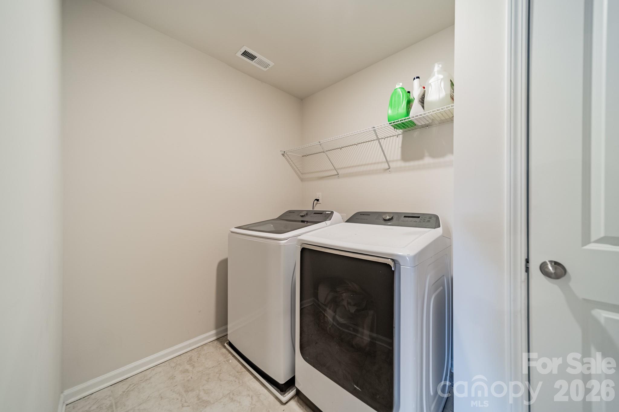 5542 Soft Shell Drive Lancaster, SC 29720 - Photo 29 of 43 a utility room with dryer and washer