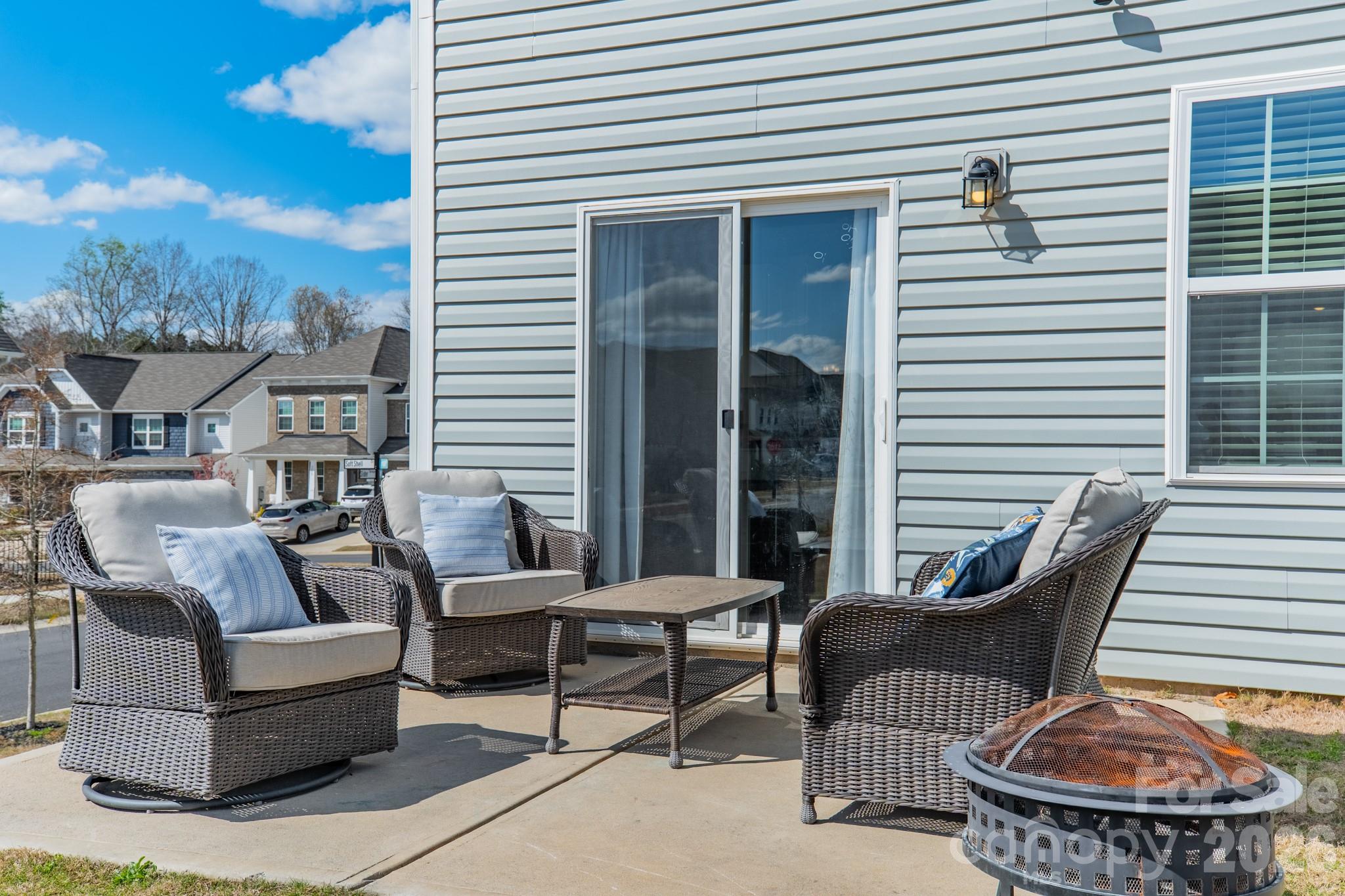 5542 Soft Shell Drive Lancaster, SC 29720 - Photo 36 of 43 a balcony with furniture and a potted plant