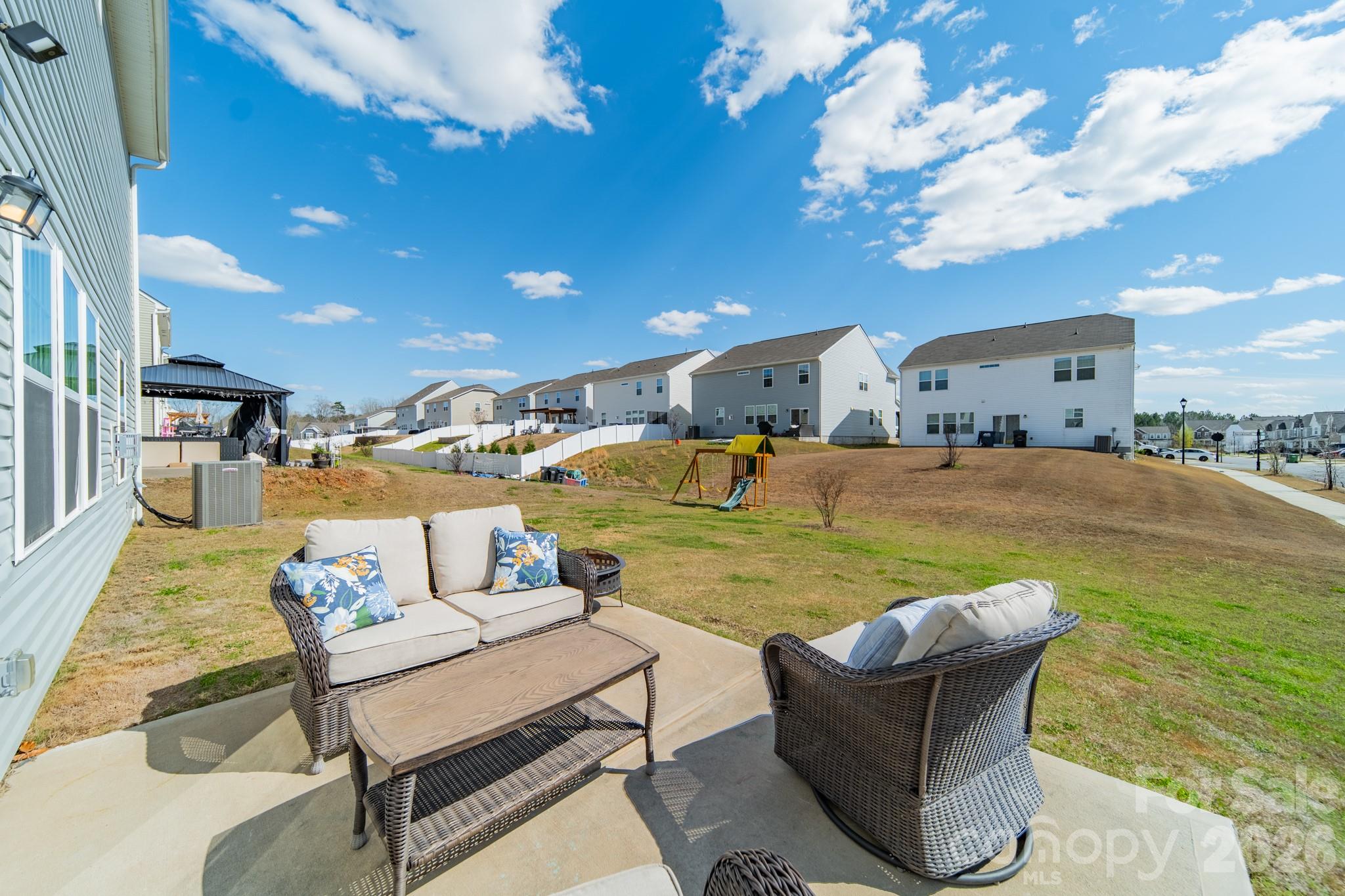 5542 Soft Shell Drive Lancaster, SC 29720 - Photo 37 of 43 a swimming pool with outdoor seating and yard