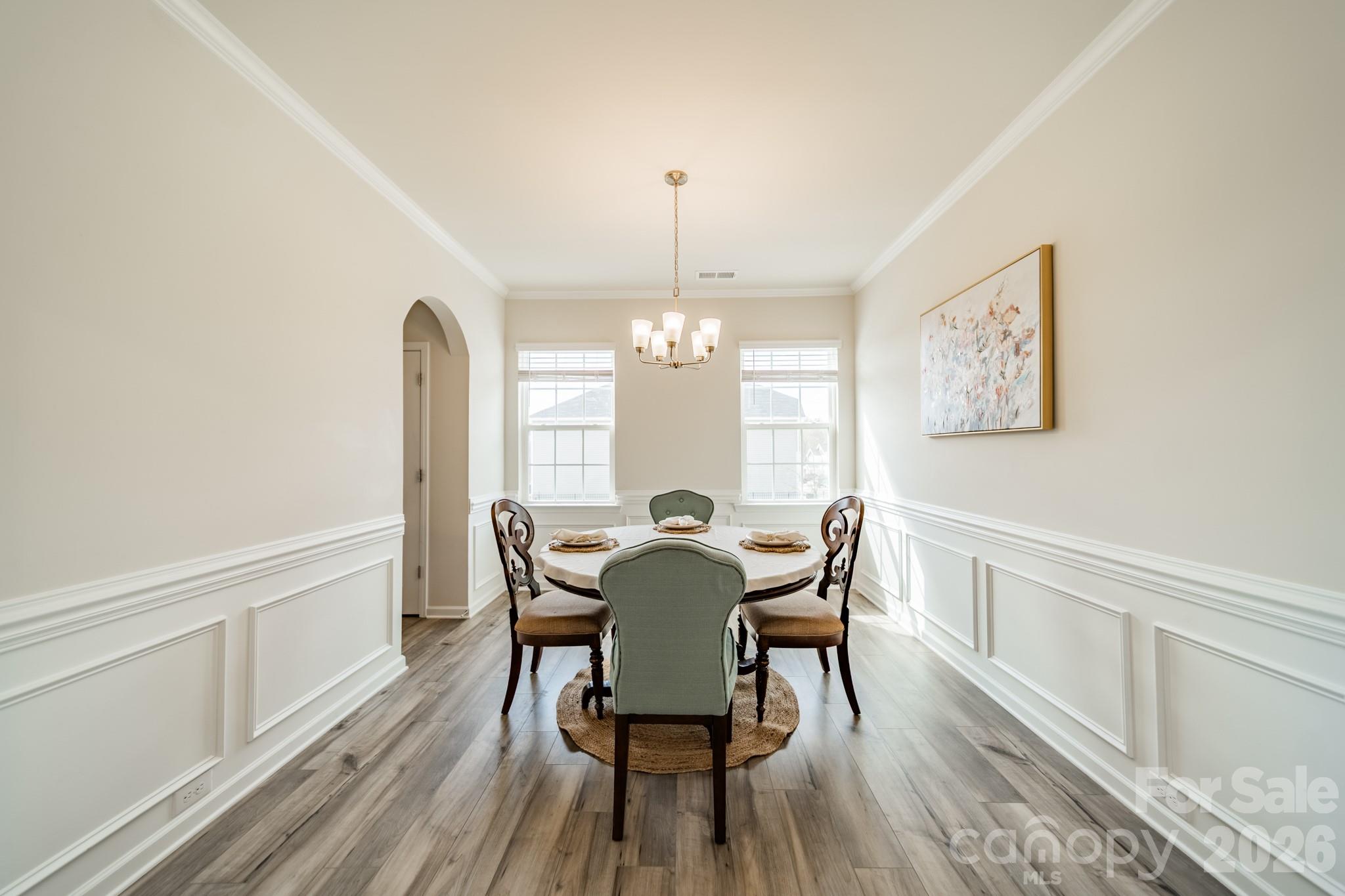 5542 Soft Shell Drive Lancaster, SC 29720 - Photo 6 of 43 a view of a dining room with furniture window and wooden floor