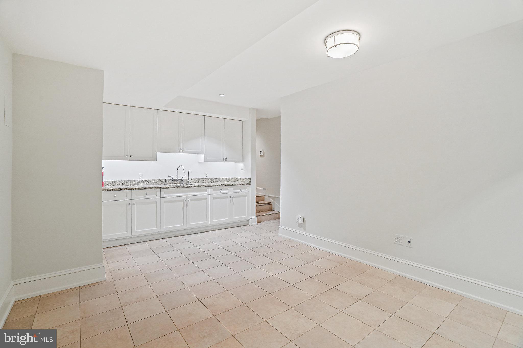 3127 P Street Northwest Washington, DC 20007 - Photo 37 of 46 lower level living