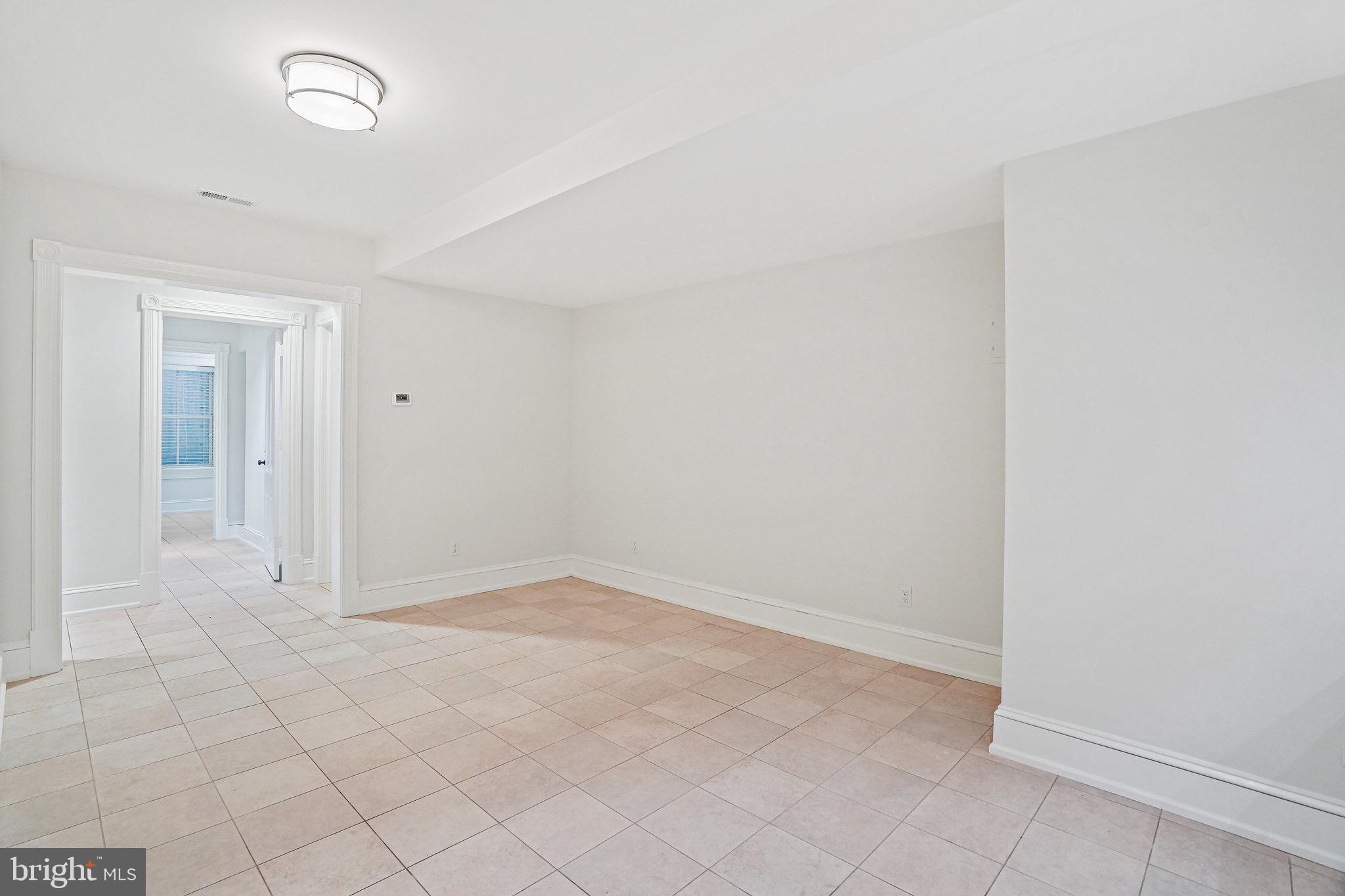 3127 P Street Northwest Washington, DC 20007 - Photo 38 of 46 lower level living