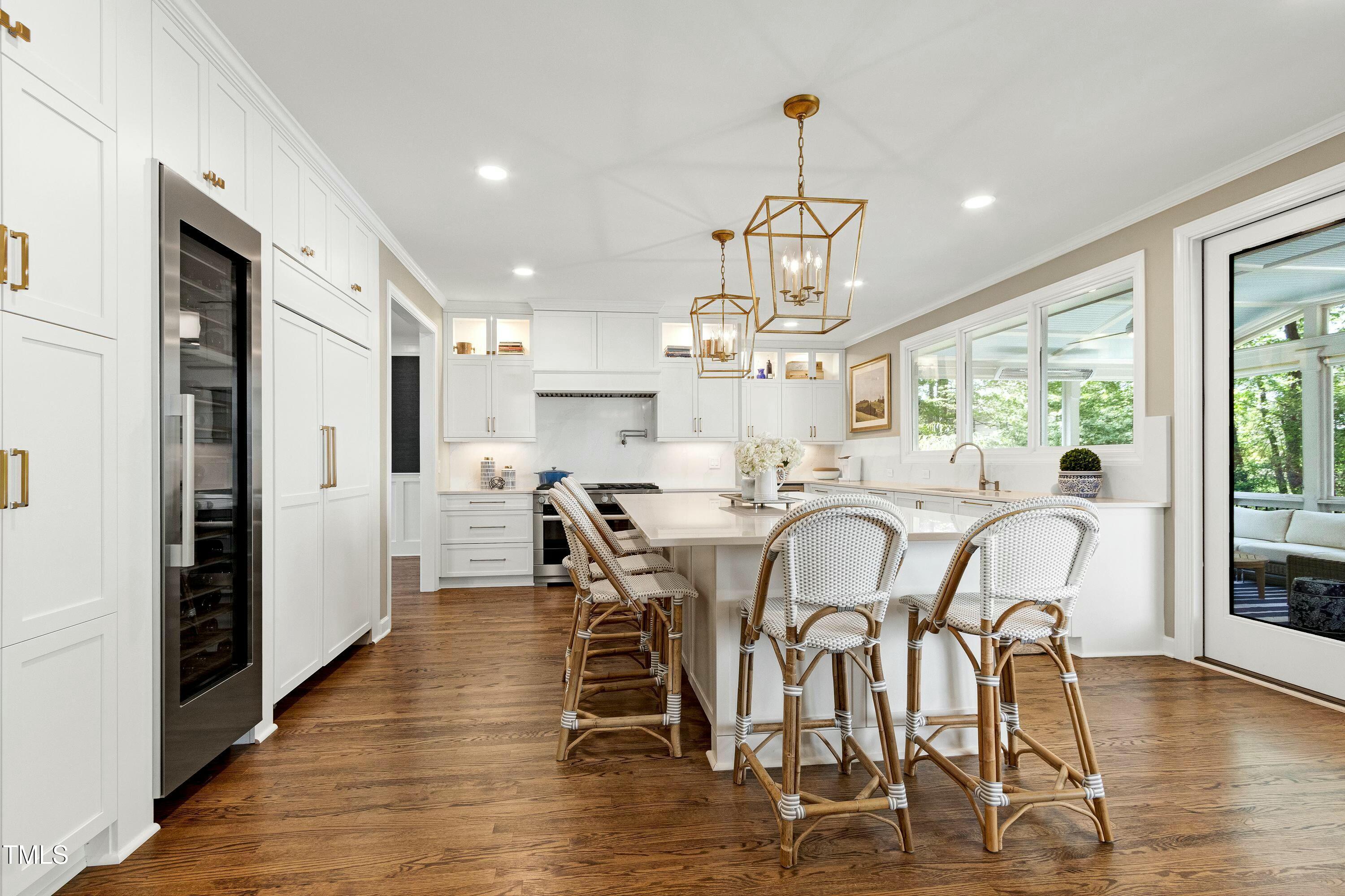 111 Finnway Lane Cary, NC 27519 - Photo 11 of 68 a view of a dining room with furniture window and wooden floor