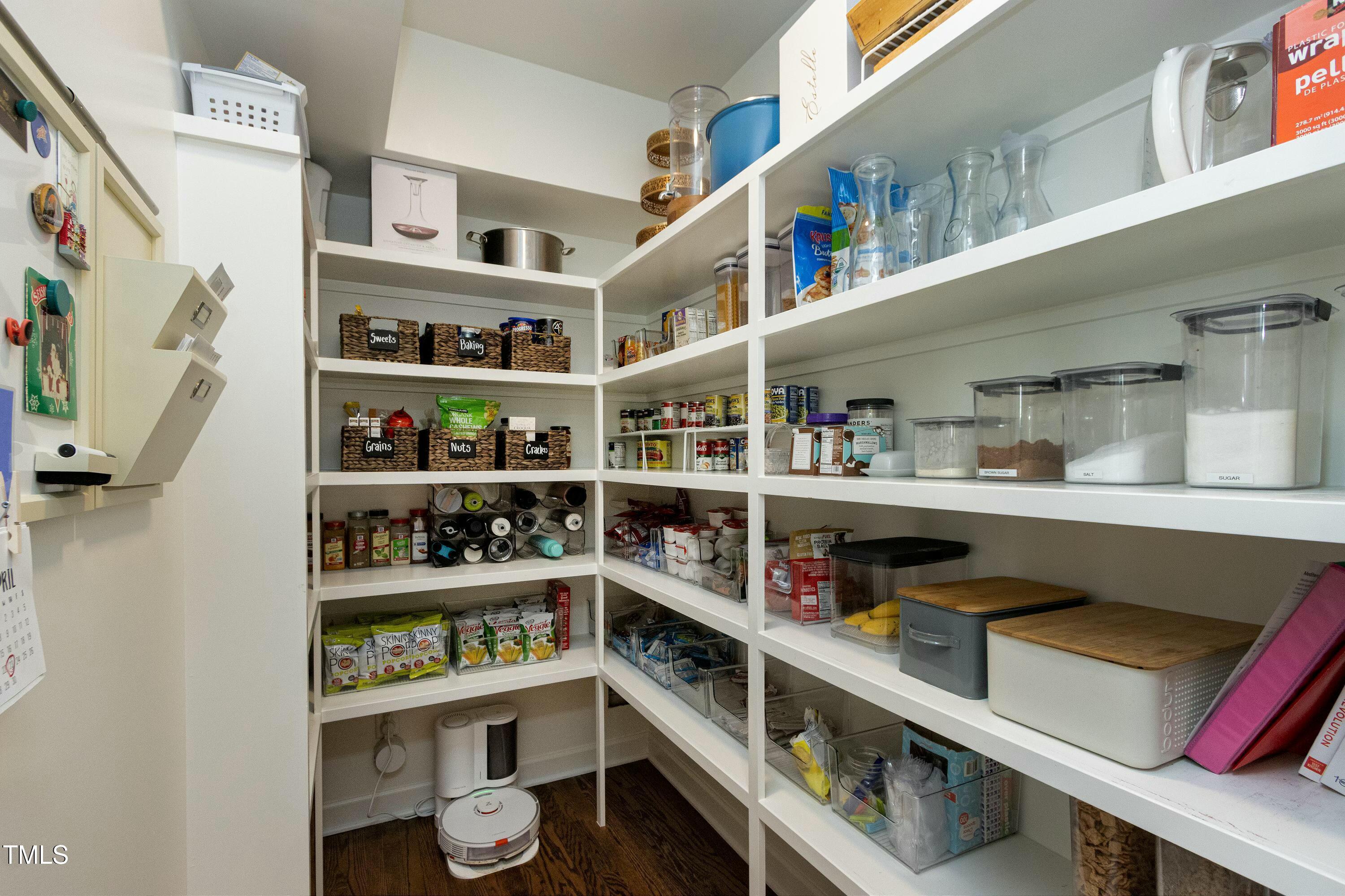 111 Finnway Lane Cary, NC 27519 - Photo 12 of 68 a shelf with books and knick knacks on it