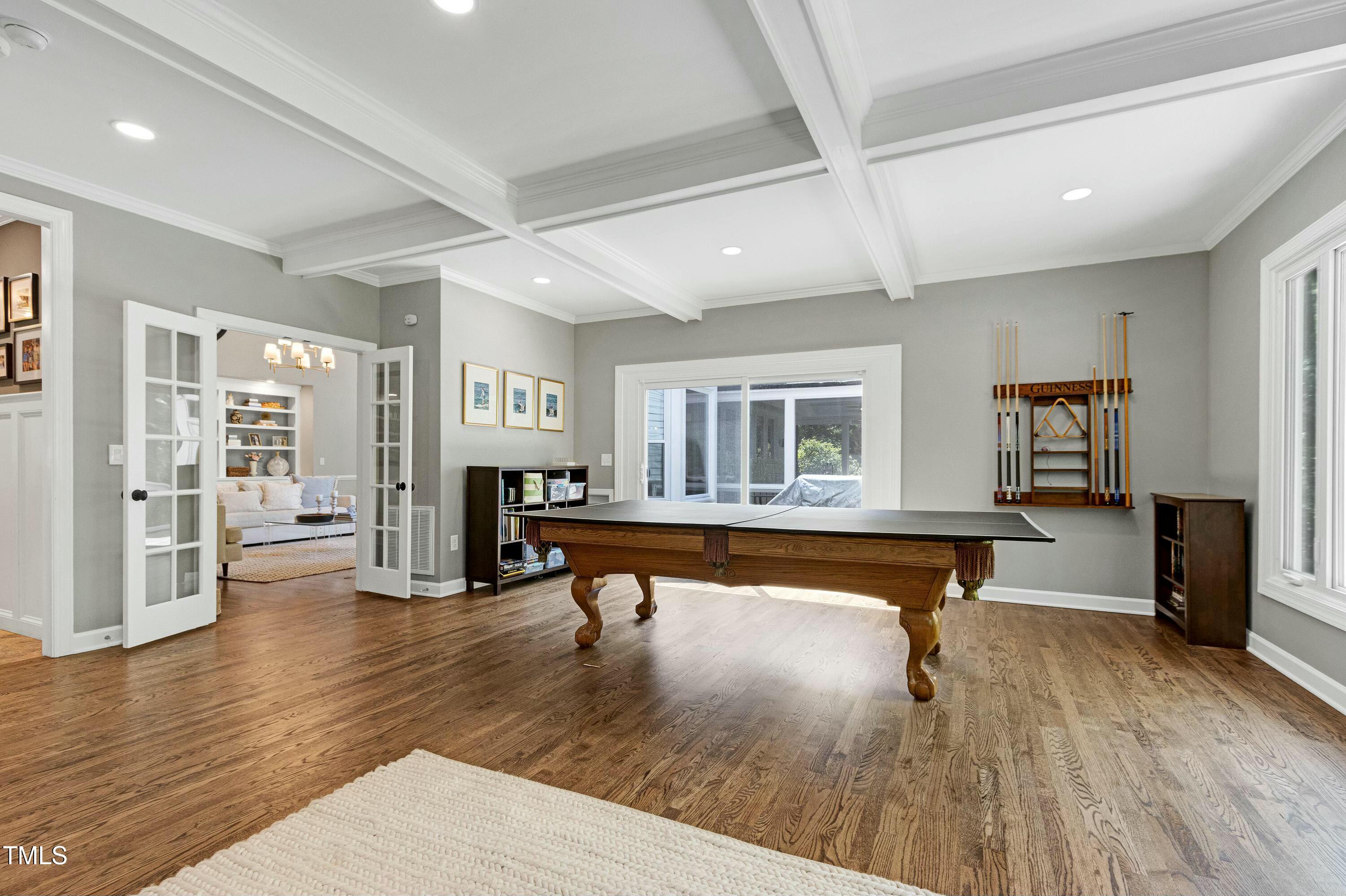 111 Finnway Lane Cary, NC 27519 - Photo 19 of 68 a living room with furniture and a wooden floor