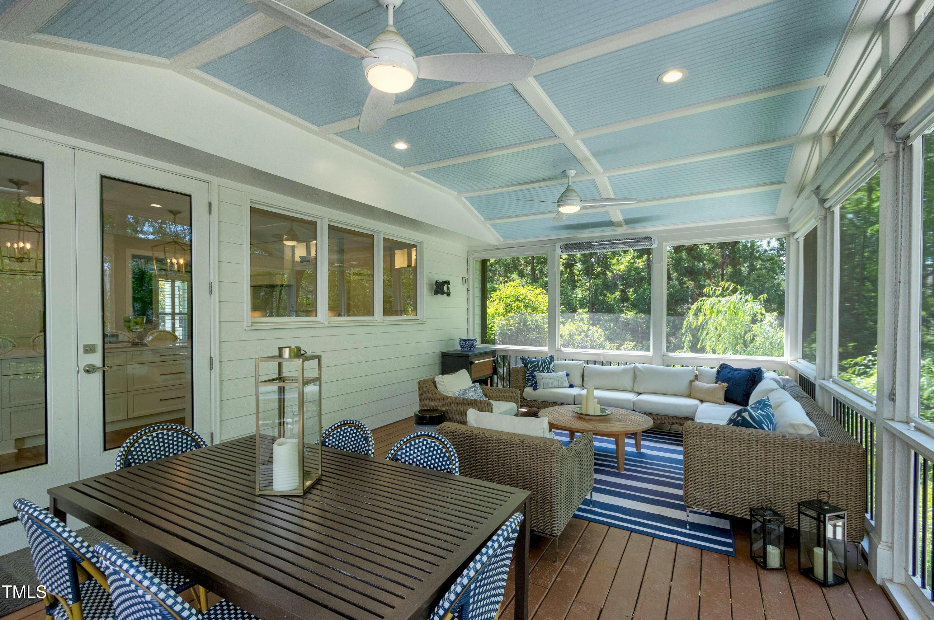 111 Finnway Lane Cary, NC 27519 - Photo 22 of 68 a living room with furniture and a table