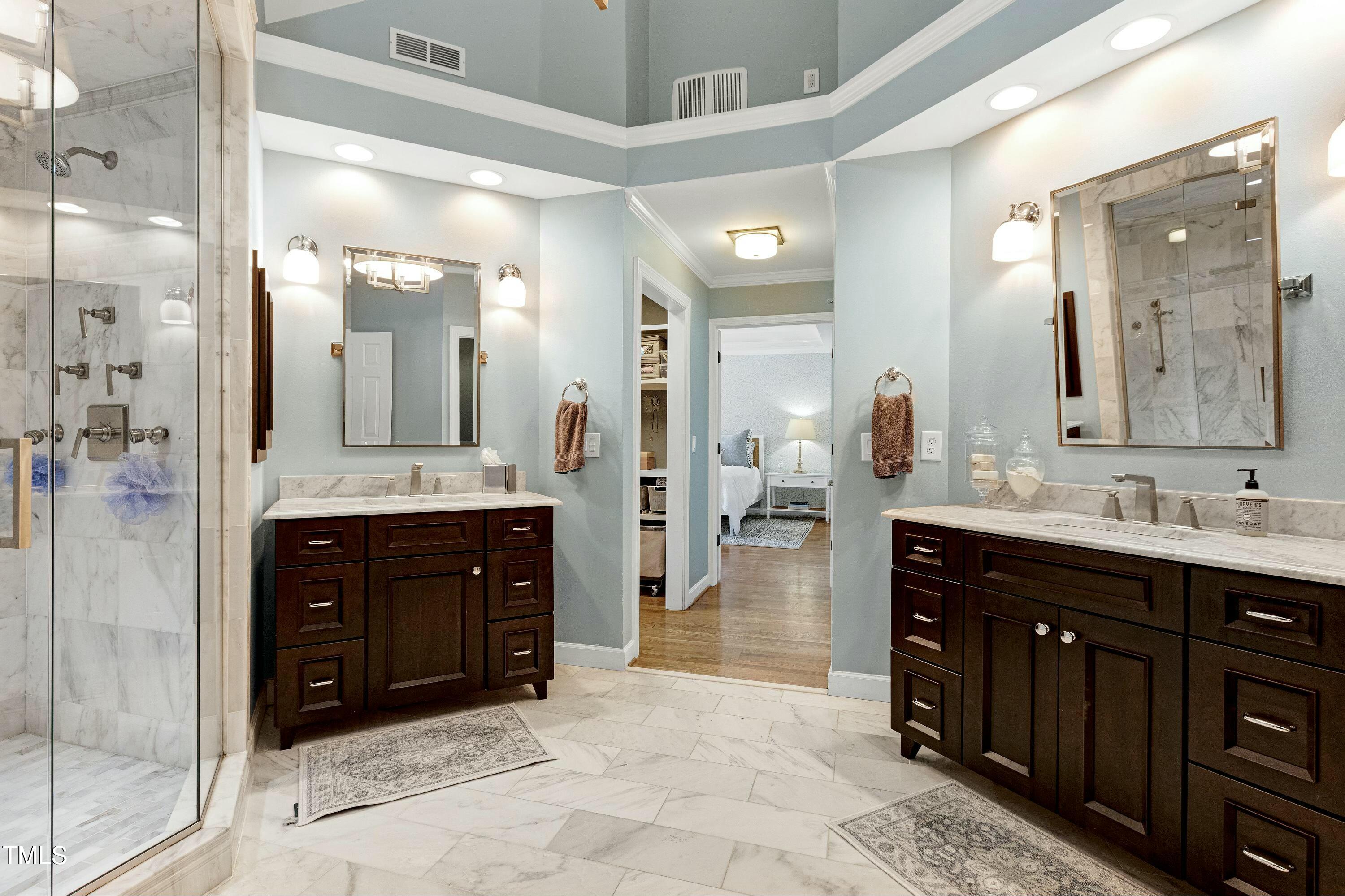 111 Finnway Lane Cary, NC 27519 - Photo 33 of 68 a spacious bathroom with a double vanity sink mirror and double