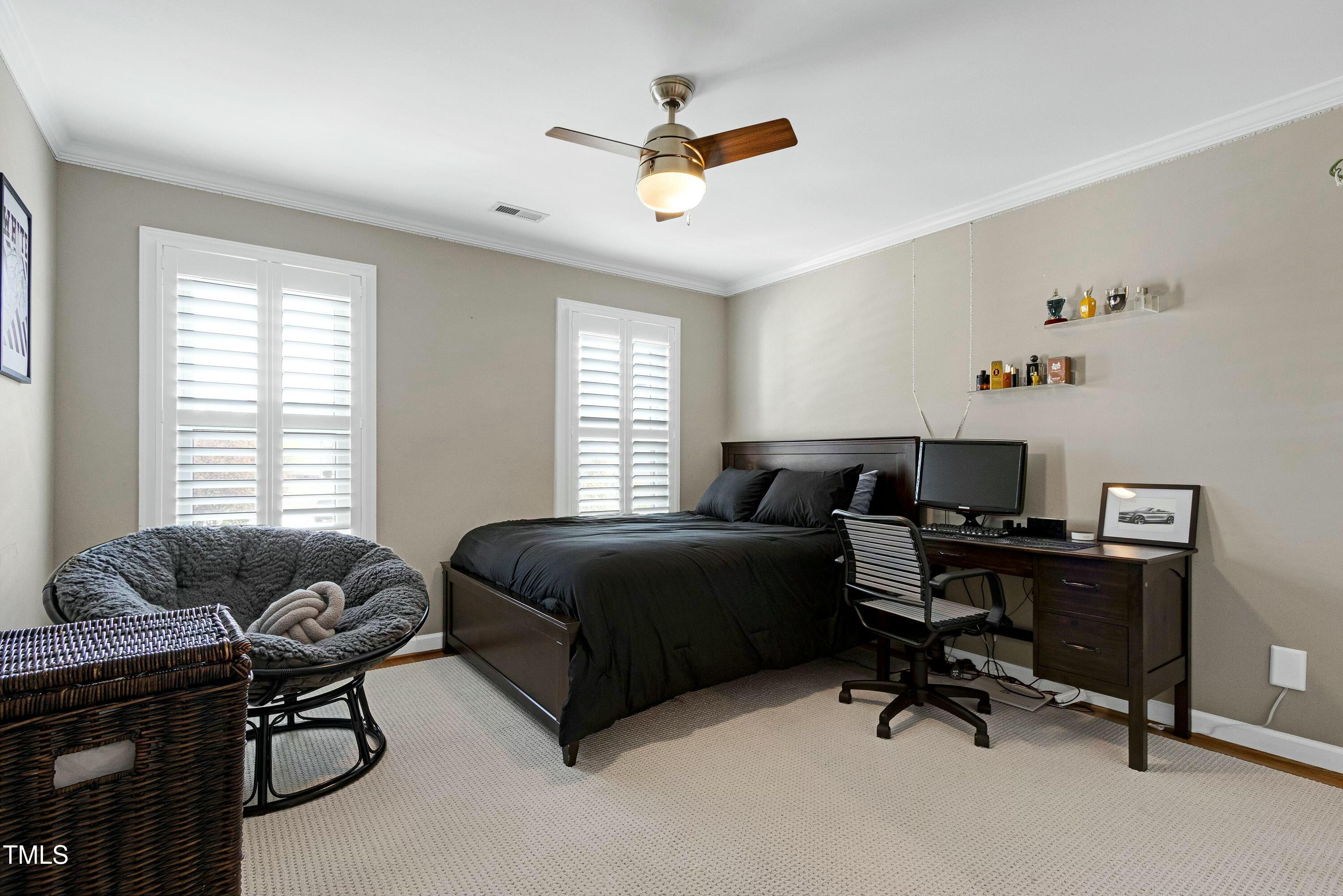 111 Finnway Lane Cary, NC 27519 - Photo 36 of 68 a living room with furniture and a window