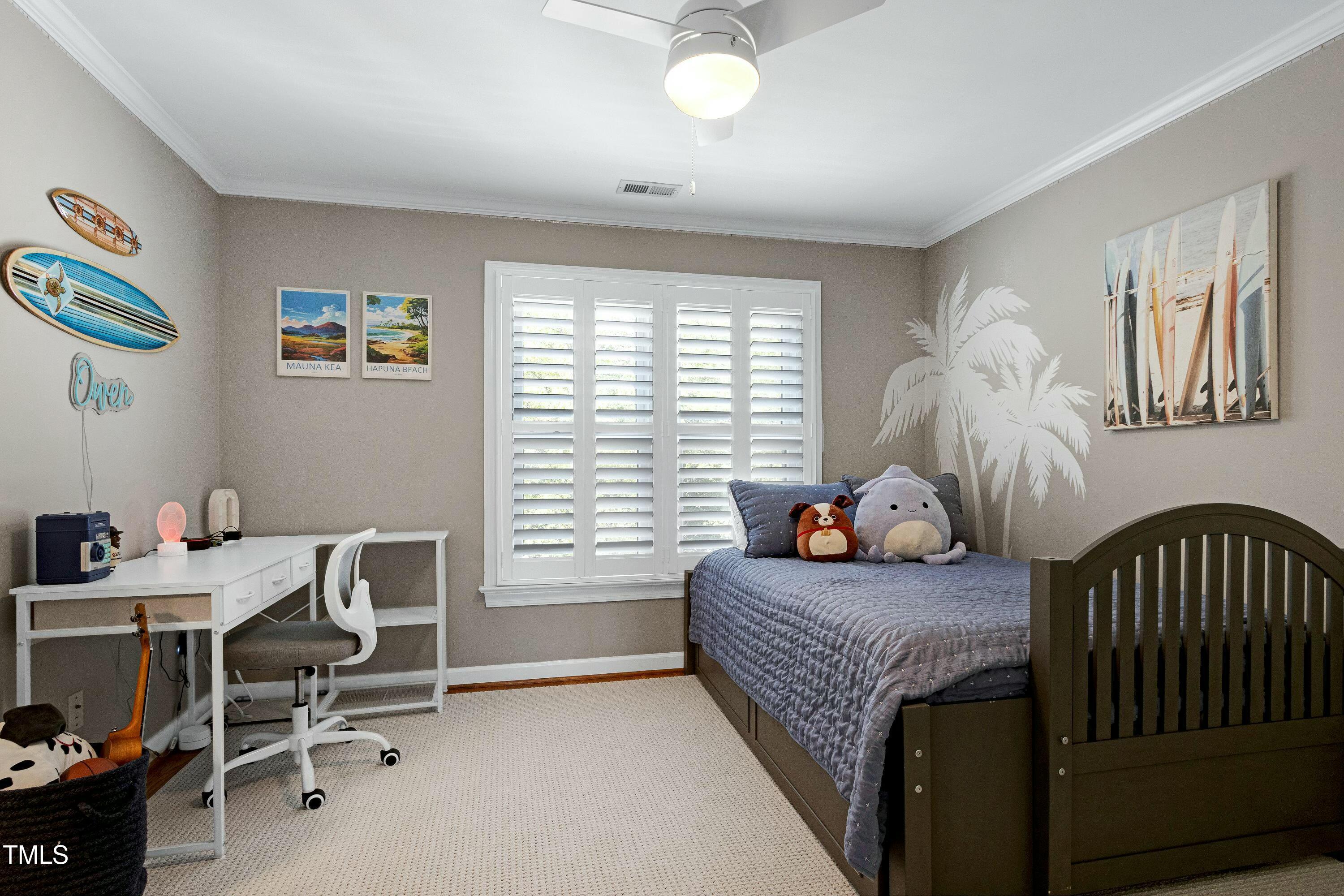 111 Finnway Lane Cary, NC 27519 - Photo 40 of 68 a bedroom with a bed and a window