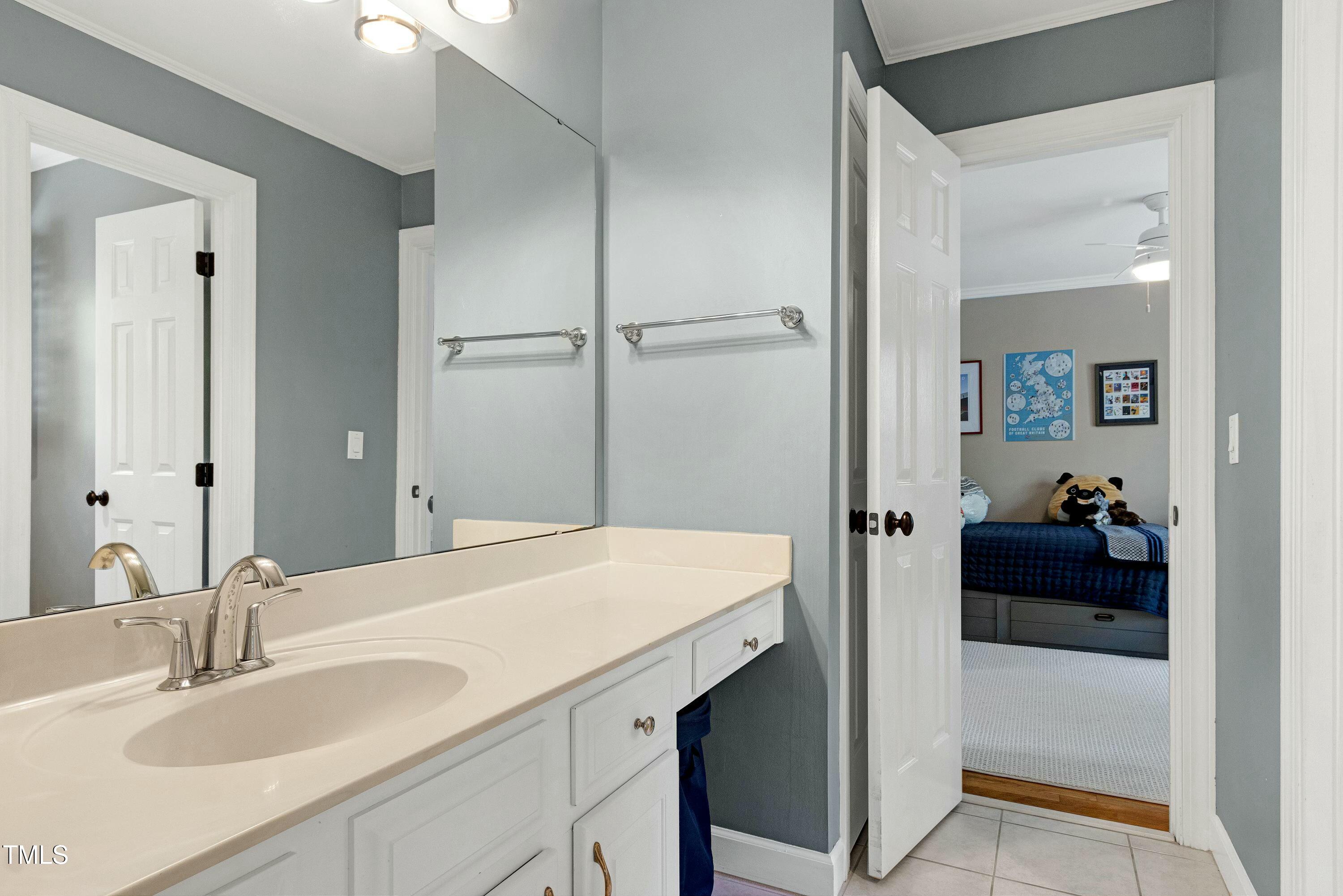 111 Finnway Lane Cary, NC 27519 - Photo 41 of 68 a en suite bathroom with a sink and vanity