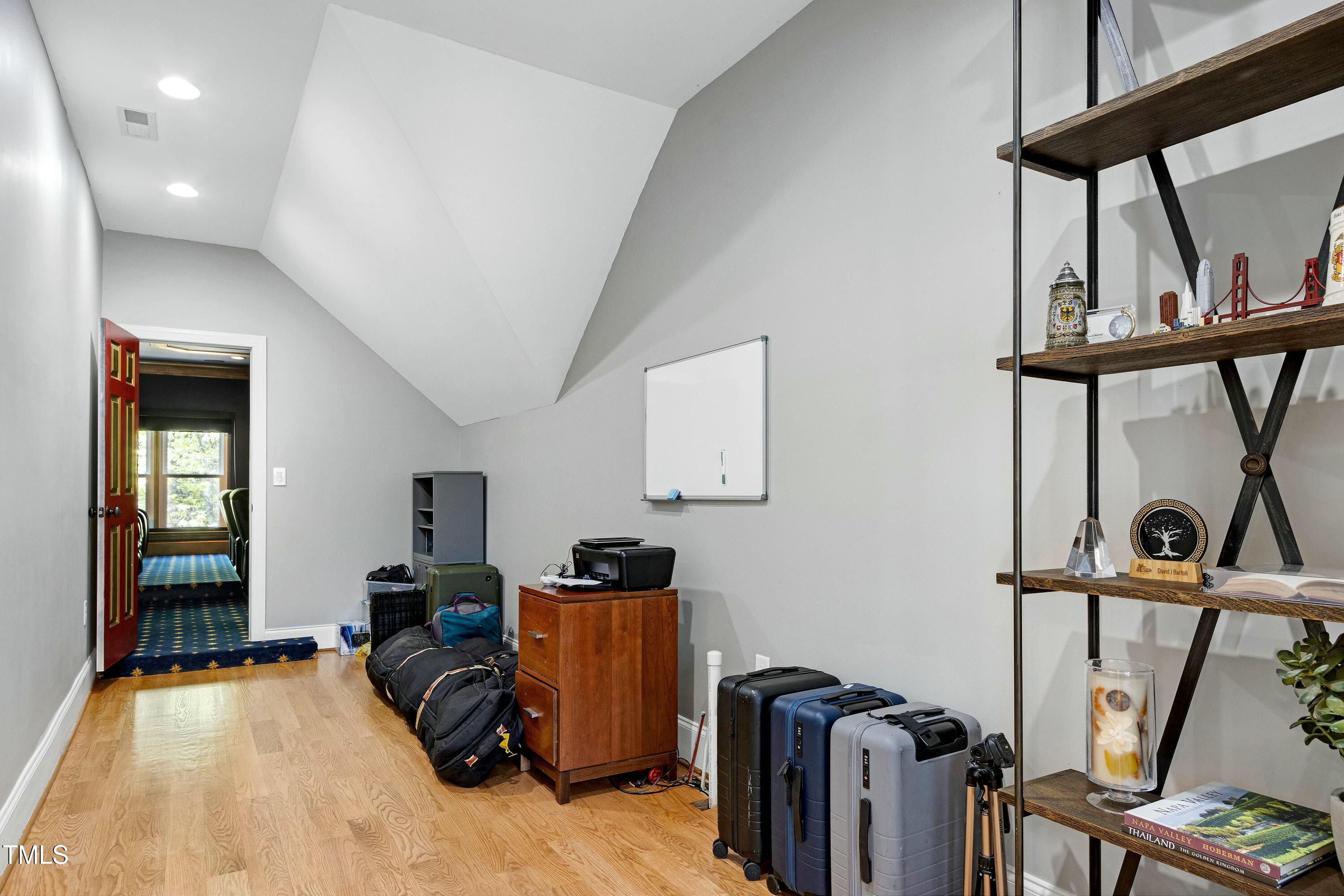 111 Finnway Lane Cary, NC 27519 - Photo 44 of 68 a view of a room with gym equipment