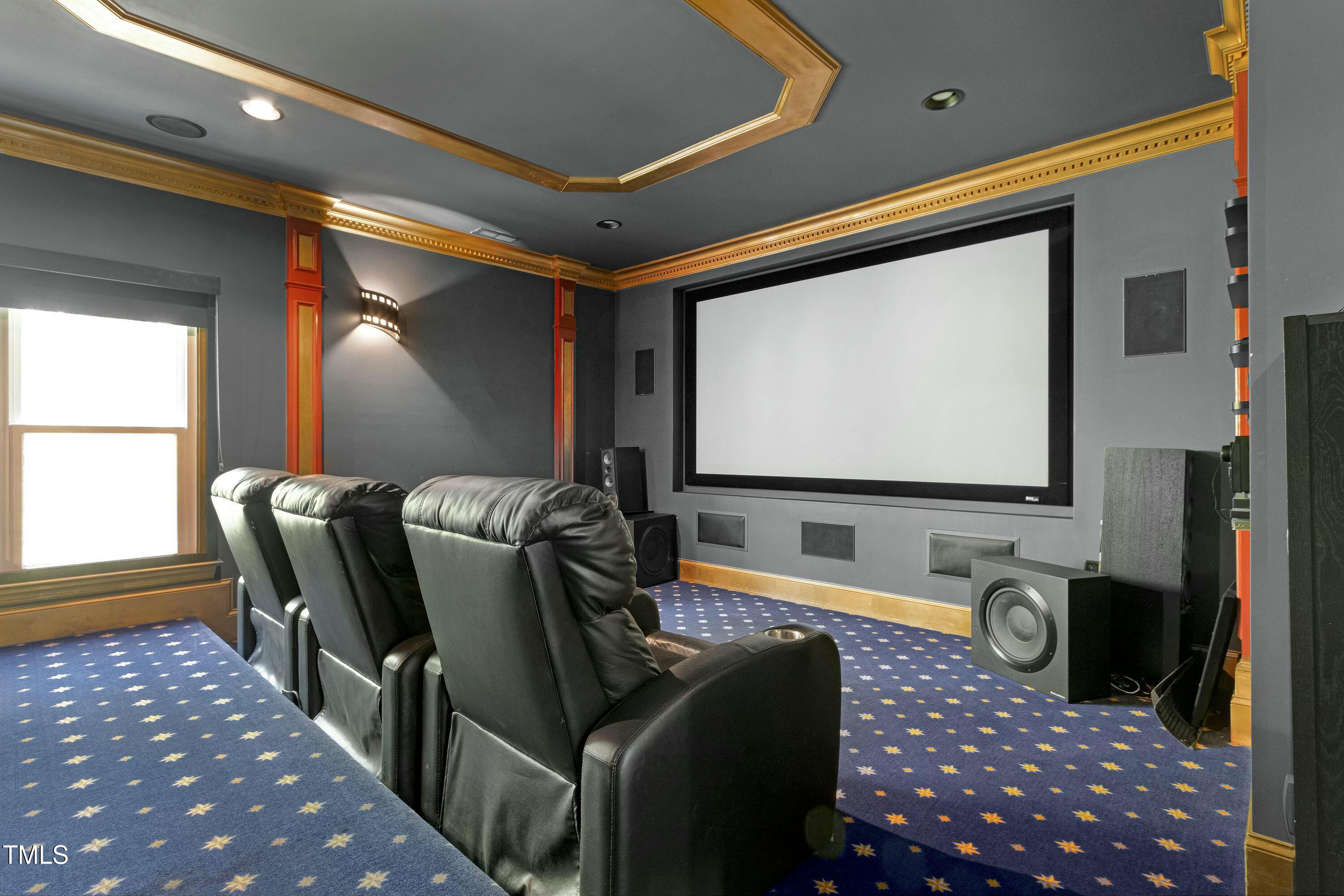111 Finnway Lane Cary, NC 27519 - Photo 46 of 68 a living room with furniture and a flat screen tv