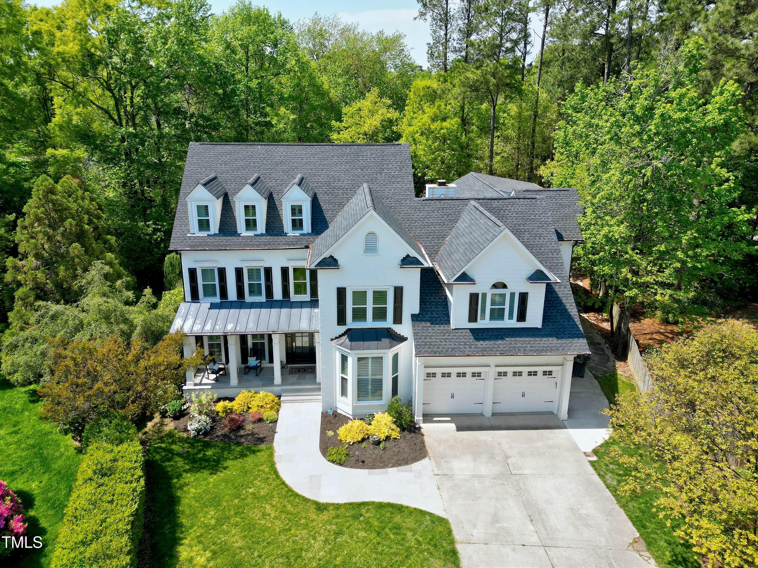 111 Finnway Lane Cary, NC 27519 - Photo 55 of 68 an aerial view of a house with swimming pool and garden