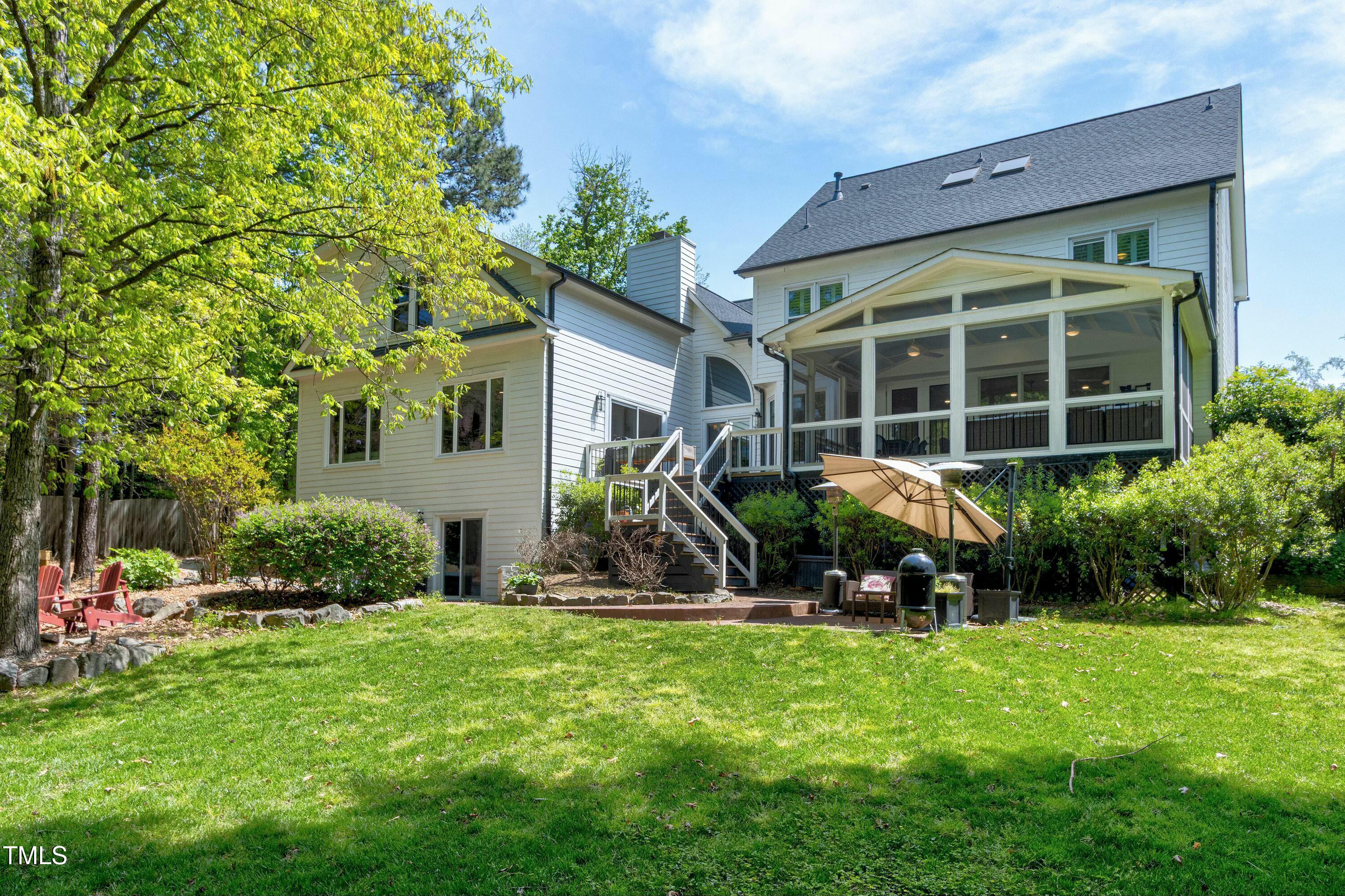 111 Finnway Lane Cary, NC 27519 - Photo 59 of 68 a front view of a house with garden