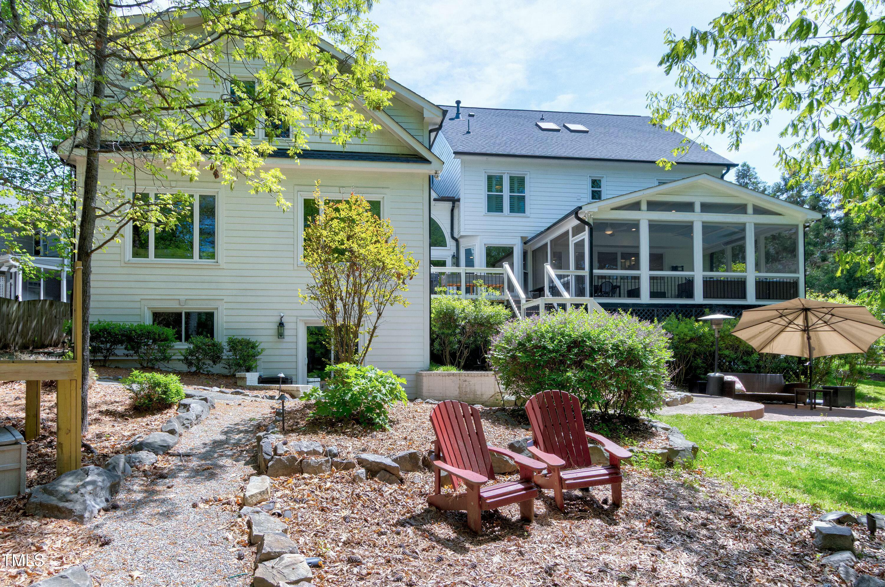 111 Finnway Lane Cary, NC 27519 - Photo 63 of 68 a view of a chair and table in backyard of the house