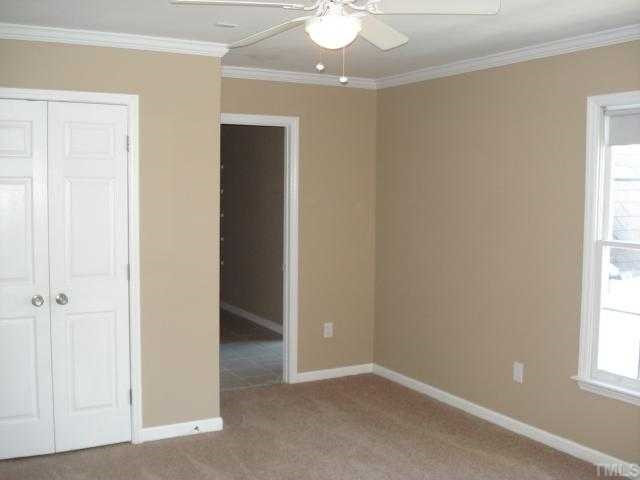 8829 Breeland Way Raleigh, NC 27613 - Photo 8 of 12 Very Large Secondary Bedrooms - even has crown molding! New Carpet throughout entire house!