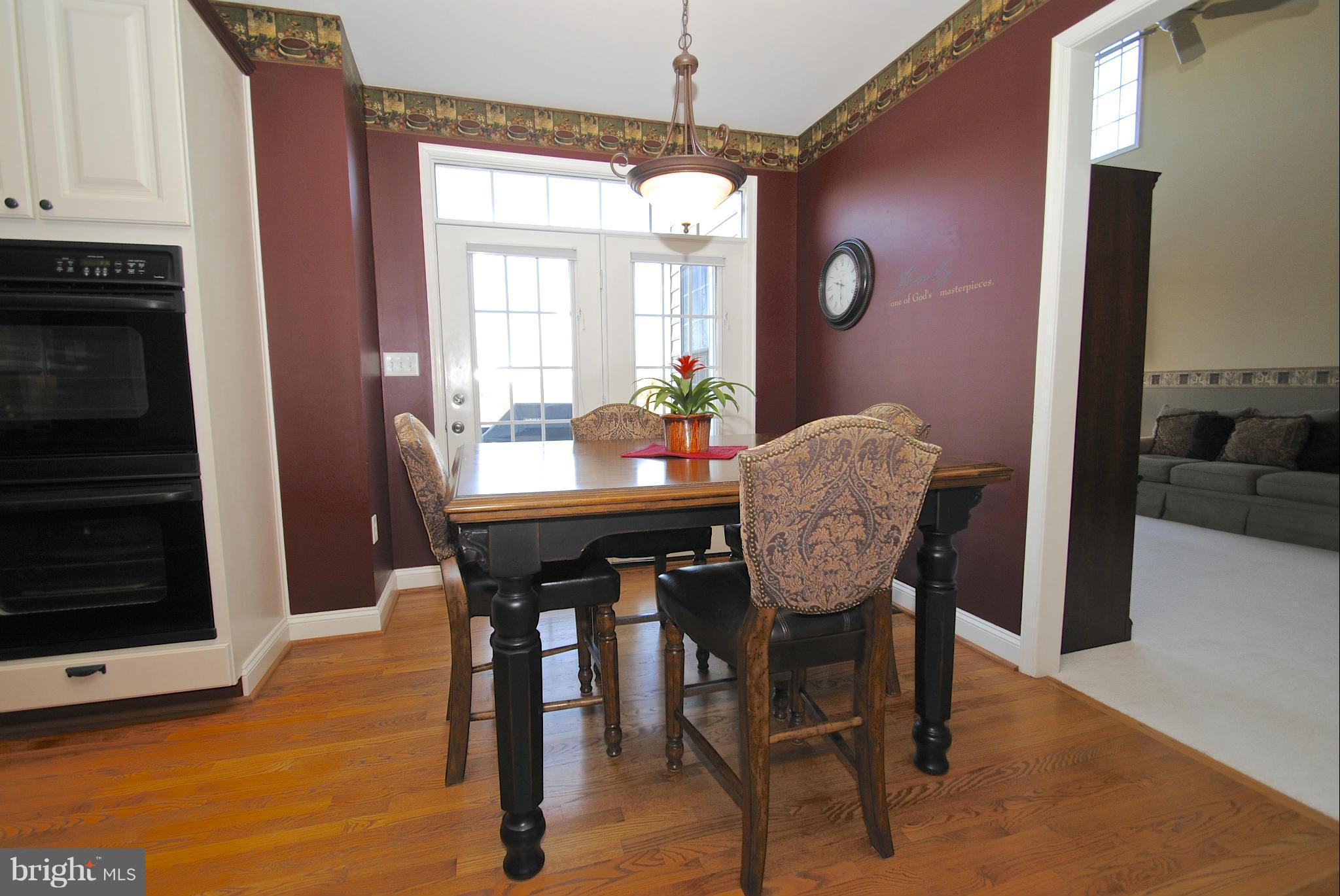 6120 Scaggs Road Owings, MD 20736 - Photo 4 of 29 a dining room with furniture and window