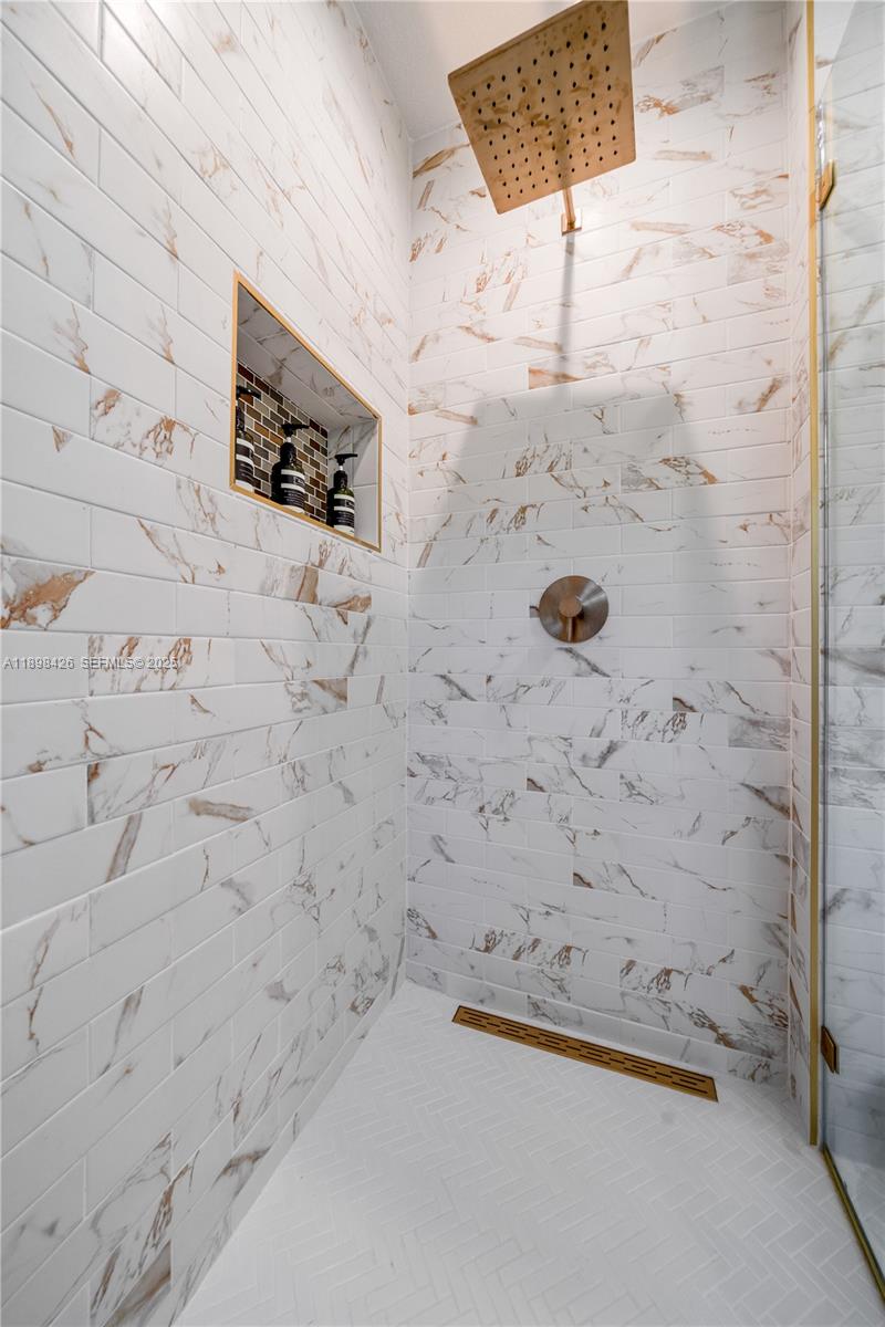 29880 Southwest 183rd Court Homestead, FL 33030 - Photo 25 of 36 a bathroom with shower