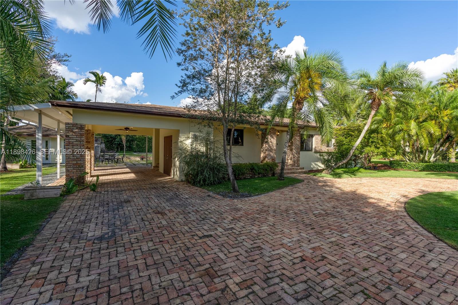 29880 Southwest 183rd Court Homestead, FL 33030 - Photo 36 of 36 a view of a house with a yard