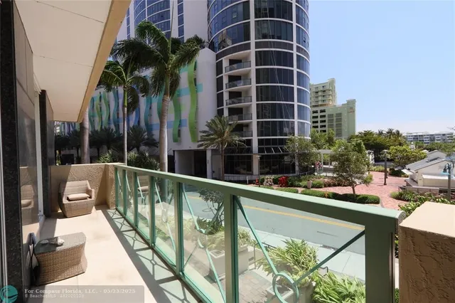 a view of swimming pool from a balcony