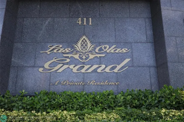 a sign that is on a wooden wall