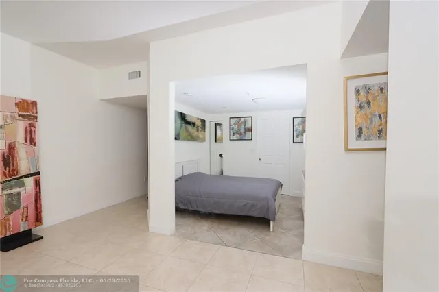 a bedroom with furniture and closet